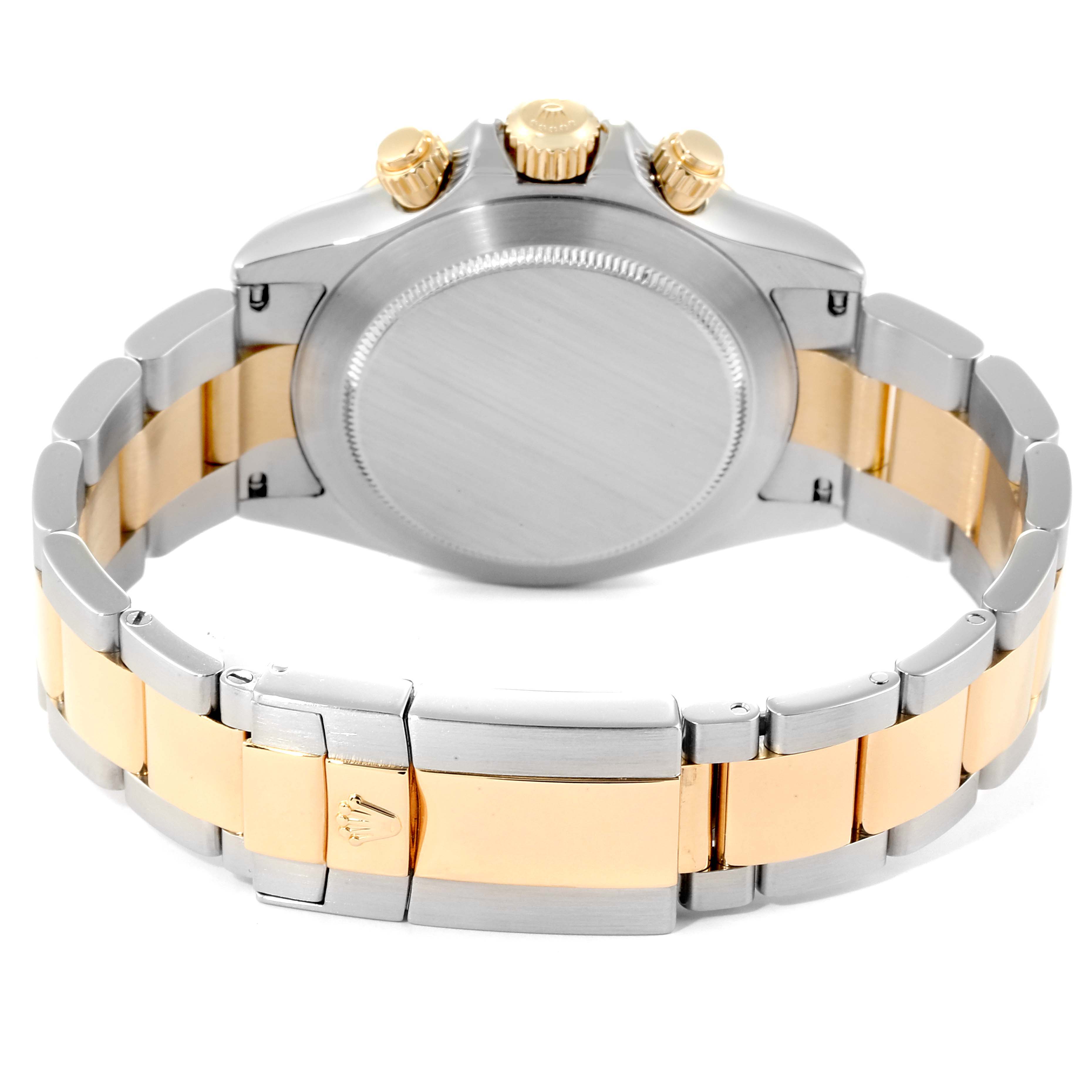 This image shows the back view of the Rolex Daytona 116523 Men
s Steel and Gold (two tone) Black Dial 116523 Men
s Steel and Gold (two tone) Black Dial watch, highlighting its bracelet, clasp, and crown components.