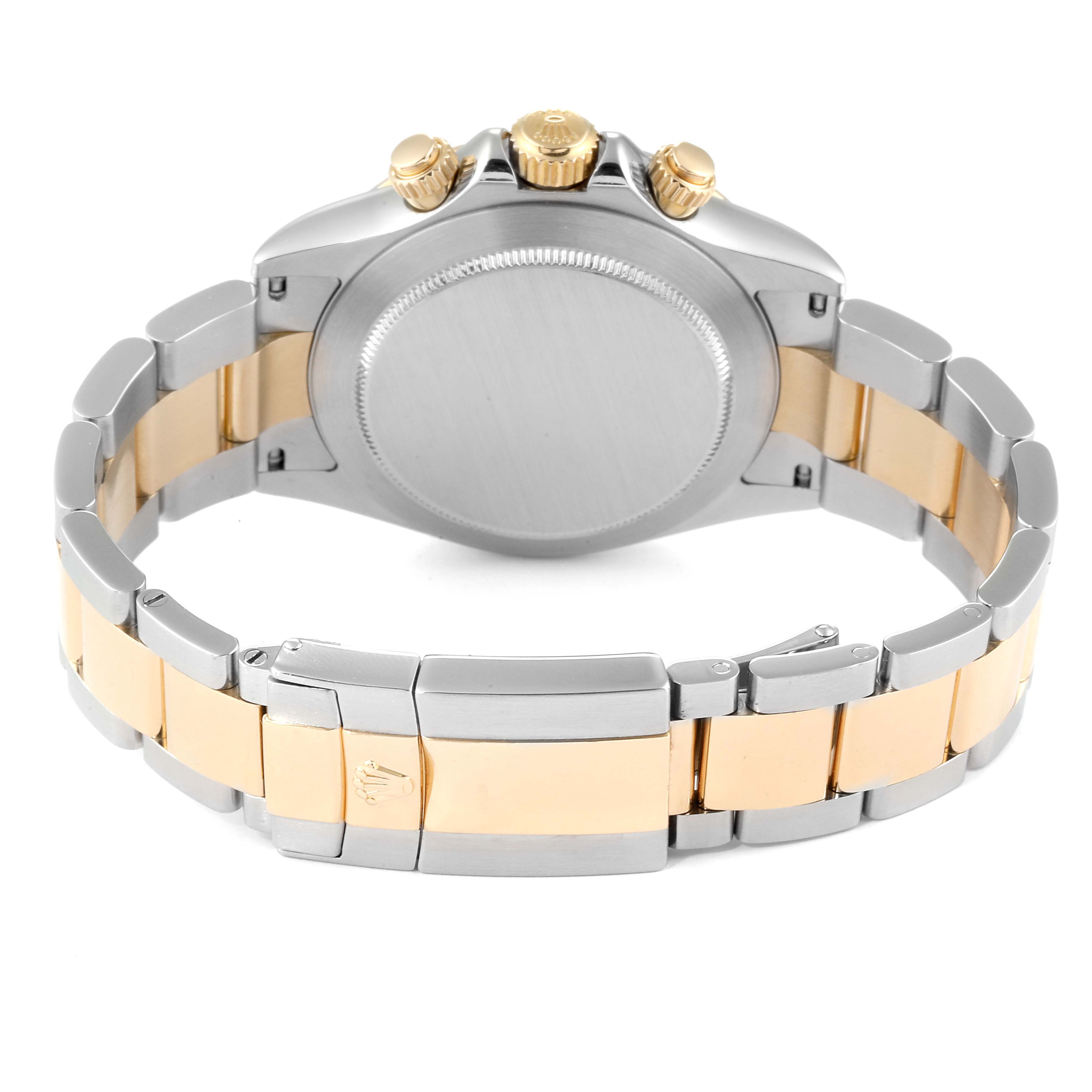 This image shows the back case and the two-tone bracelet of a Rolex Daytona 116523 Men
s Steel and Gold (two tone) Grey Dial 116523 Men
s Steel and Gold (two tone) Grey Dial model watch from a rear angle.