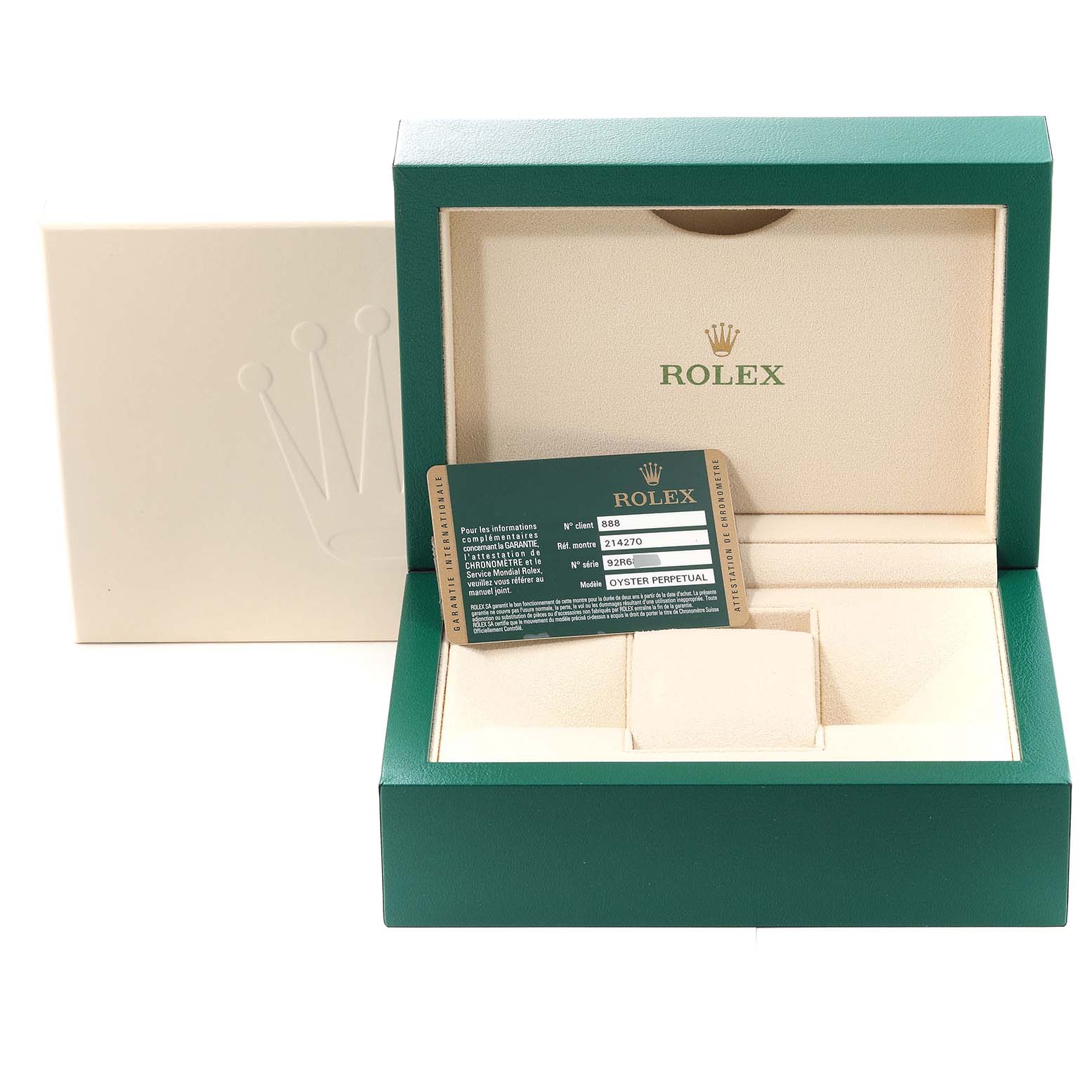 The image shows an open green and beige Rolex watch box for the Explorer model, including the warranty card.
