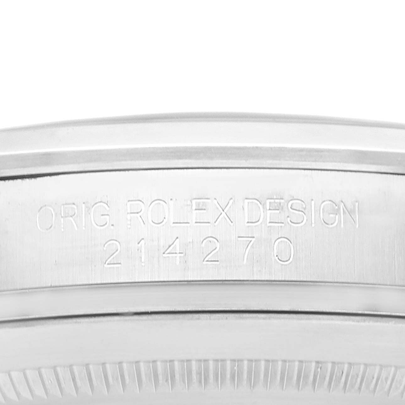 The image shows a close-up of the side of a Rolex Explorer 214270 Men
s Stainless Steel Black Dial 214270 Men
s Stainless Steel Black Dial watch, focusing on the engraved design and model number.