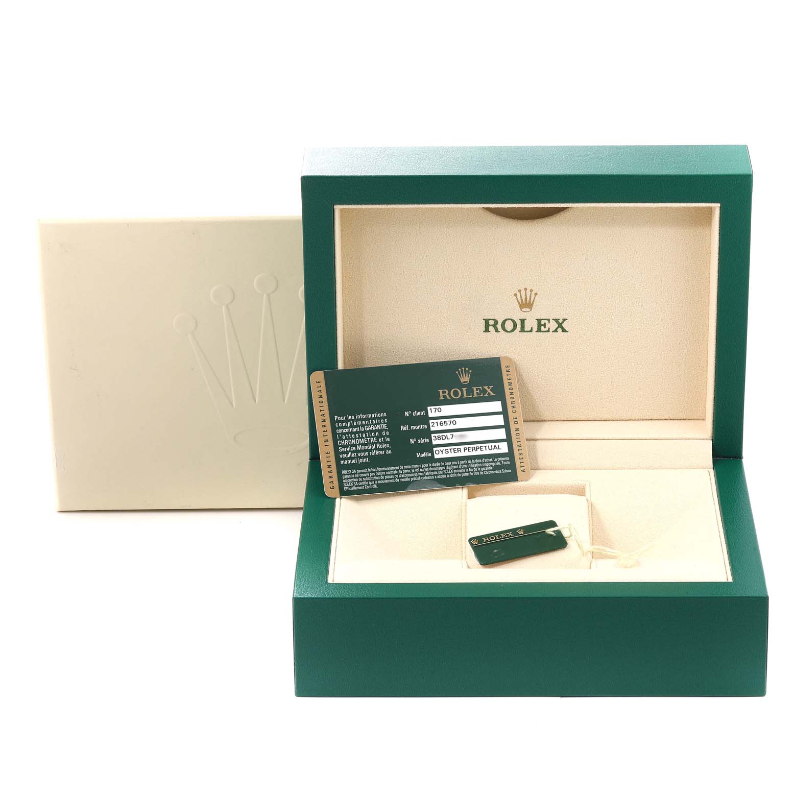 The image shows an open Rolex watch box for the Explorer model, featuring a warranty card and a tag inside.
