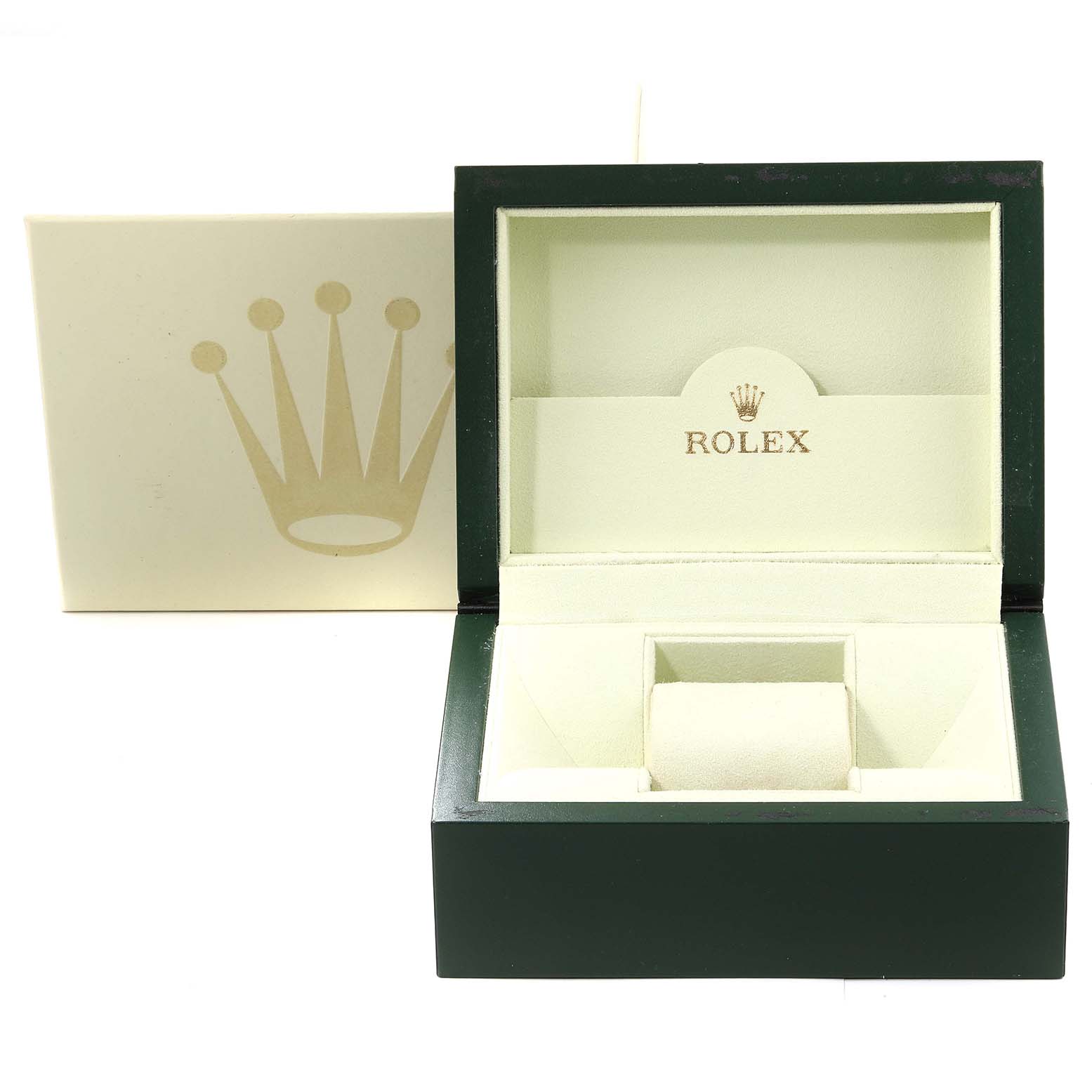 The image shows an open green-and-cream Rolex watch box, likely for the Explorer model, with a protective cushion inside.