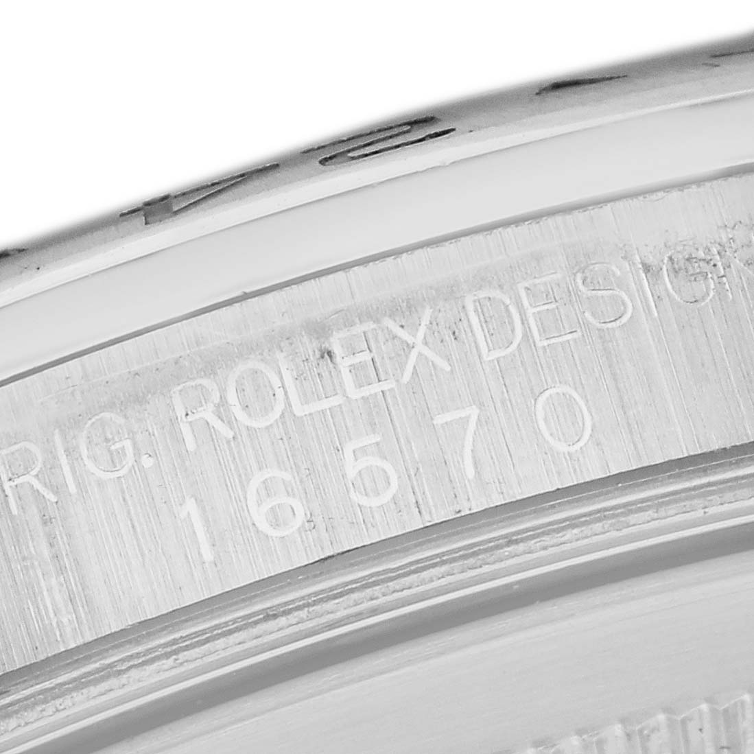 This image shows a close-up of the engraving on the case side of a Rolex Explorer 16570 Men
s Stainless Steel Black Dial 16570 Men
s Stainless Steel Black Dial watch, detailing the model number "16570."