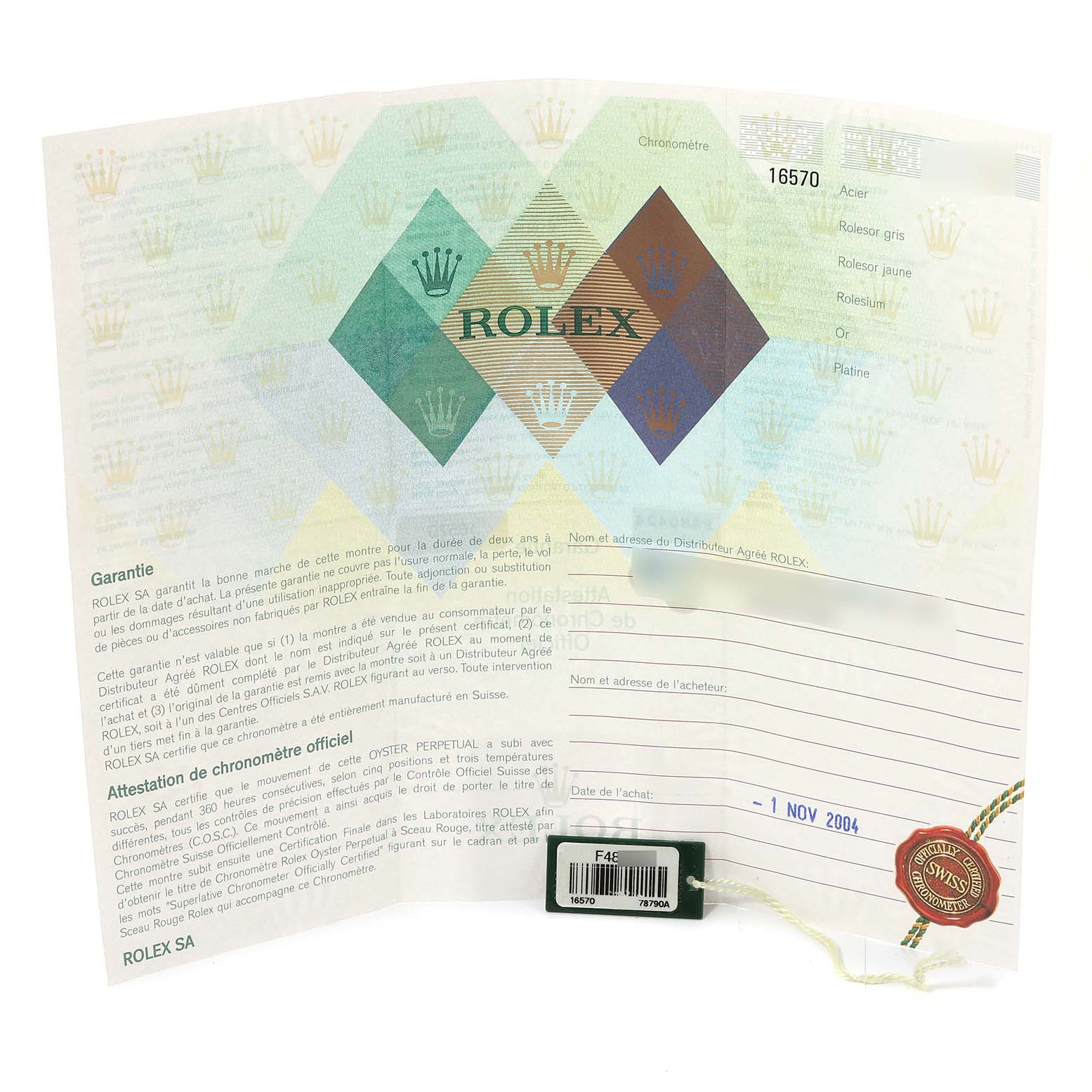 The image shows the warranty and chronometer certification papers for a Rolex Explorer 16570 Men
s Stainless Steel Black Dial 16570 Men
s Stainless Steel Black Dial model, along with a green and red tag.