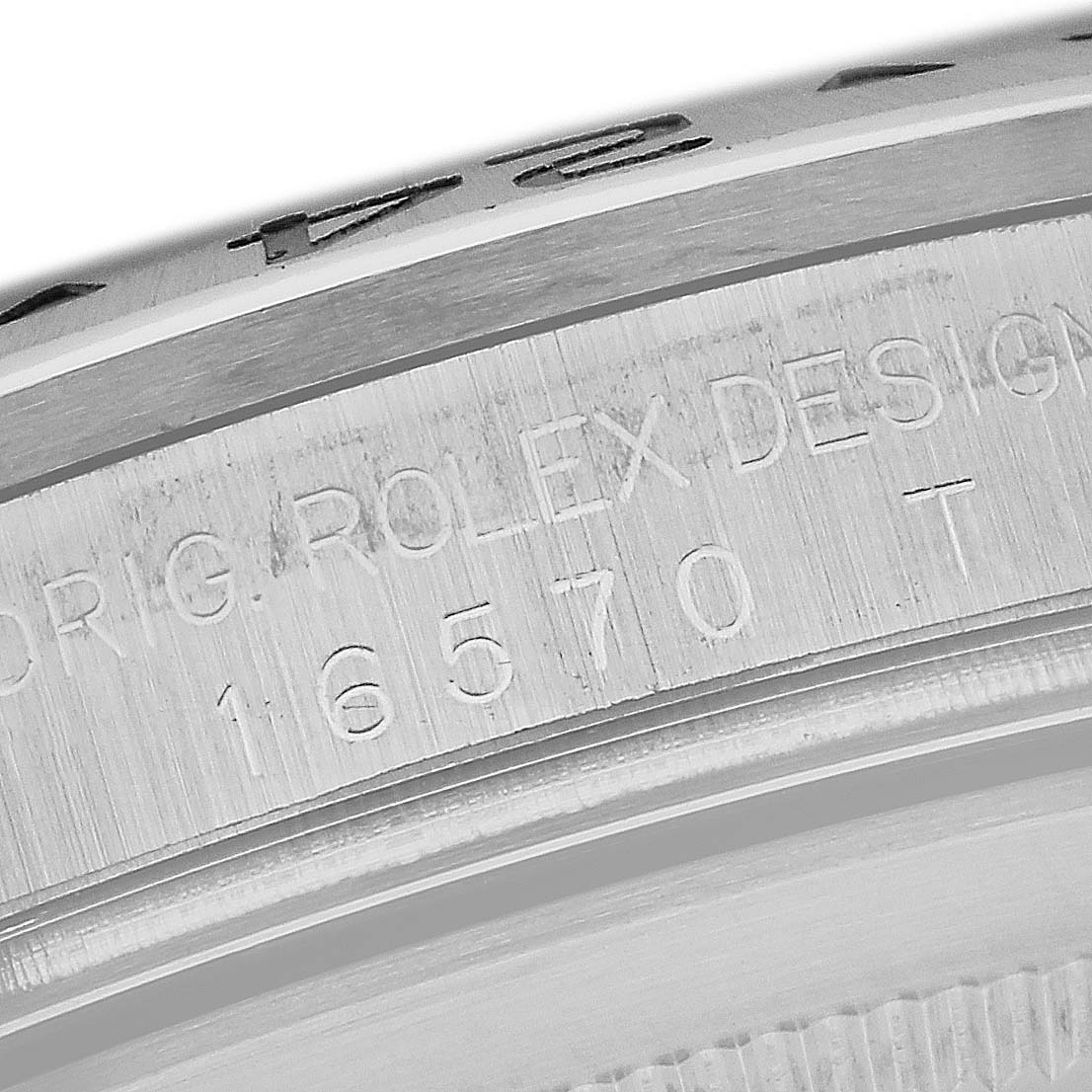 This close-up image shows the engraved details on the side of a Rolex Explorer 16570 Men
s Stainless Steel Black Dial 16570 Men
s Stainless Steel Black Dial watch case.