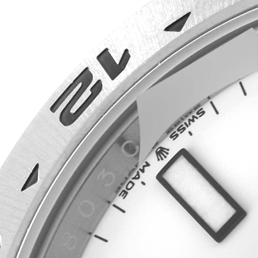 This close-up image shows a partial view of the dial and bezel of a Rolex Explorer 226570 Men
s Stainless Steel White Dial 226570 Men
s Stainless Steel White Dial watch.