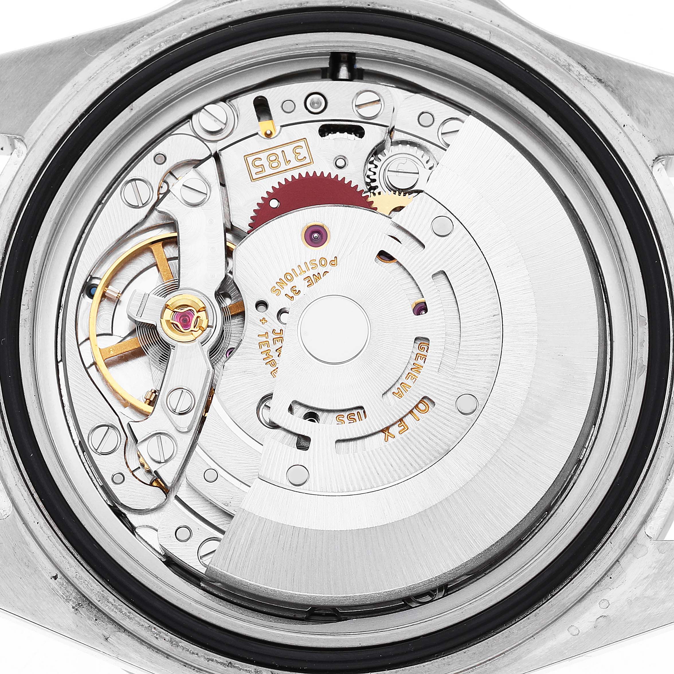 This image shows the movement of a Rolex Explorer 16570 Men's Stainless Steel Black Dial watch, viewed from the back, highlighting gears and rotor.