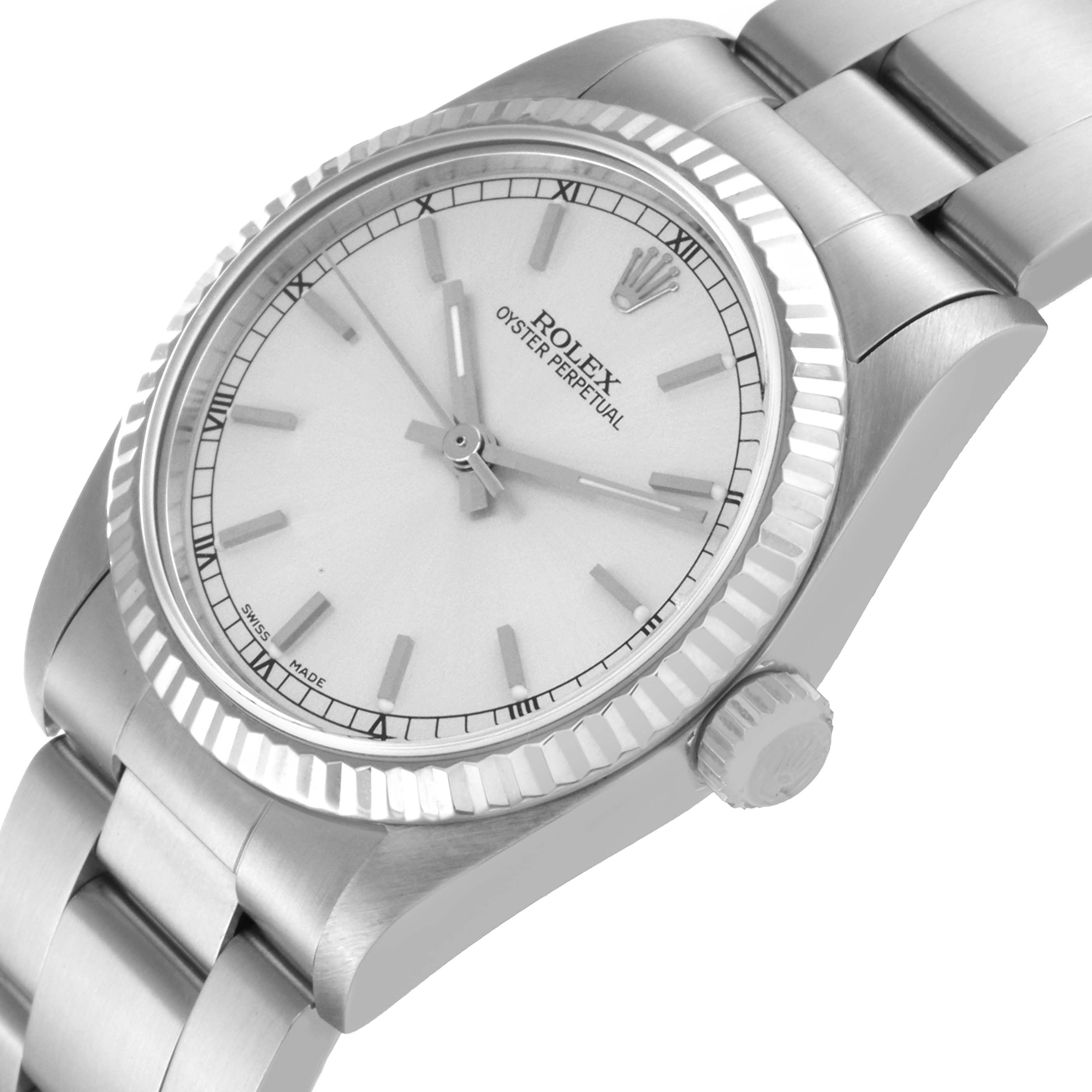The Rolex Mid-Size 77014 Women
s Stainless Steel Silver Dial 77014 Women
s Stainless Steel Silver Dial Oyster Perpetual watch is shown at an angle, highlighting the face, bezel, crown, and part of the bracelet.