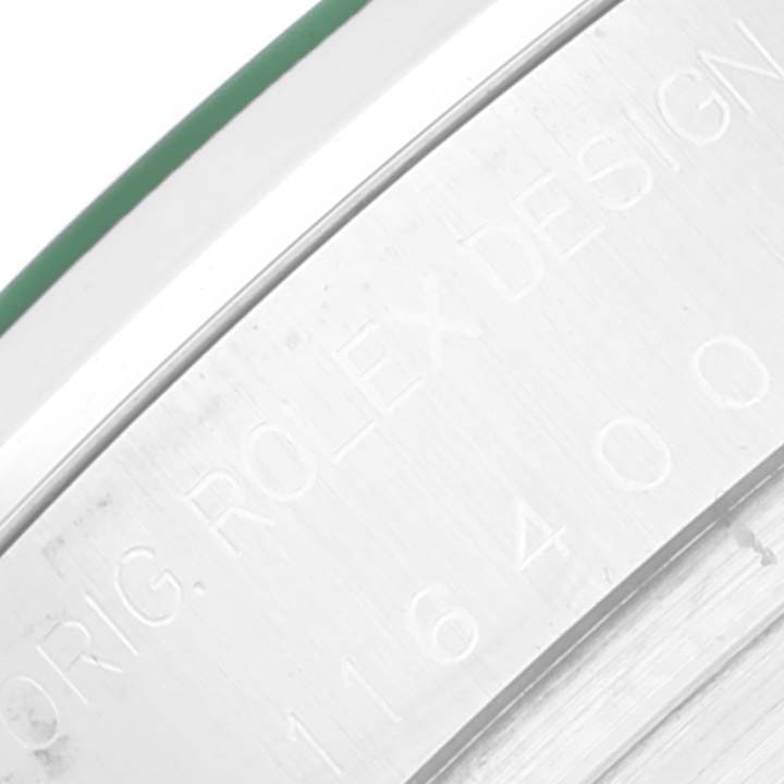 This image shows a close-up of the side of a Rolex Milgauss 116400 Men's Stainless Steel Black Dial 116400 Men's Stainless Steel Black Dial watch, featuring the engraved model number and design details.