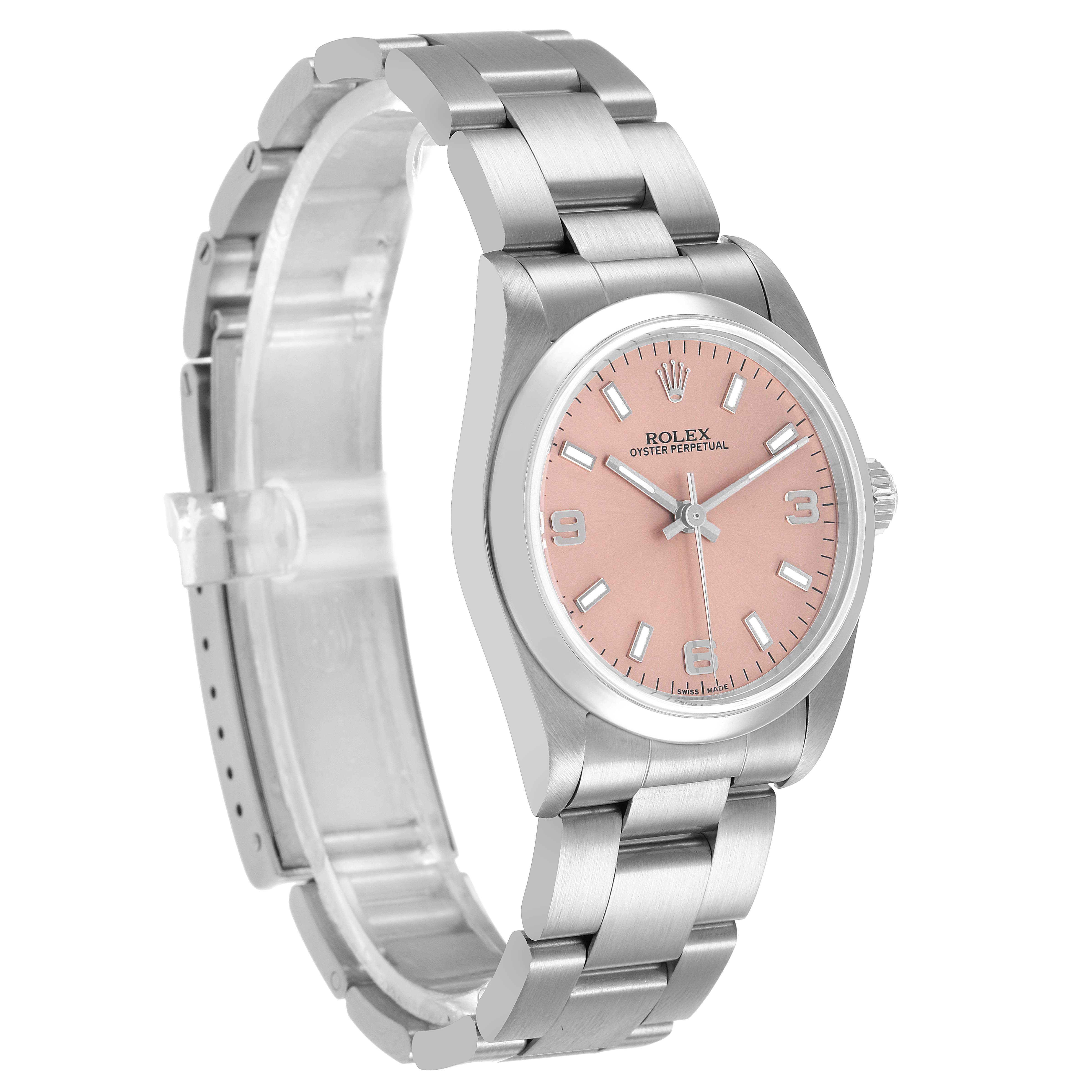 The Rolex Oyster Perpetual 77200 Women's Stainless Steel Pink Dial watch is shown at a slight angle, highlighting the bracelet, case, crown, and pink dial.
