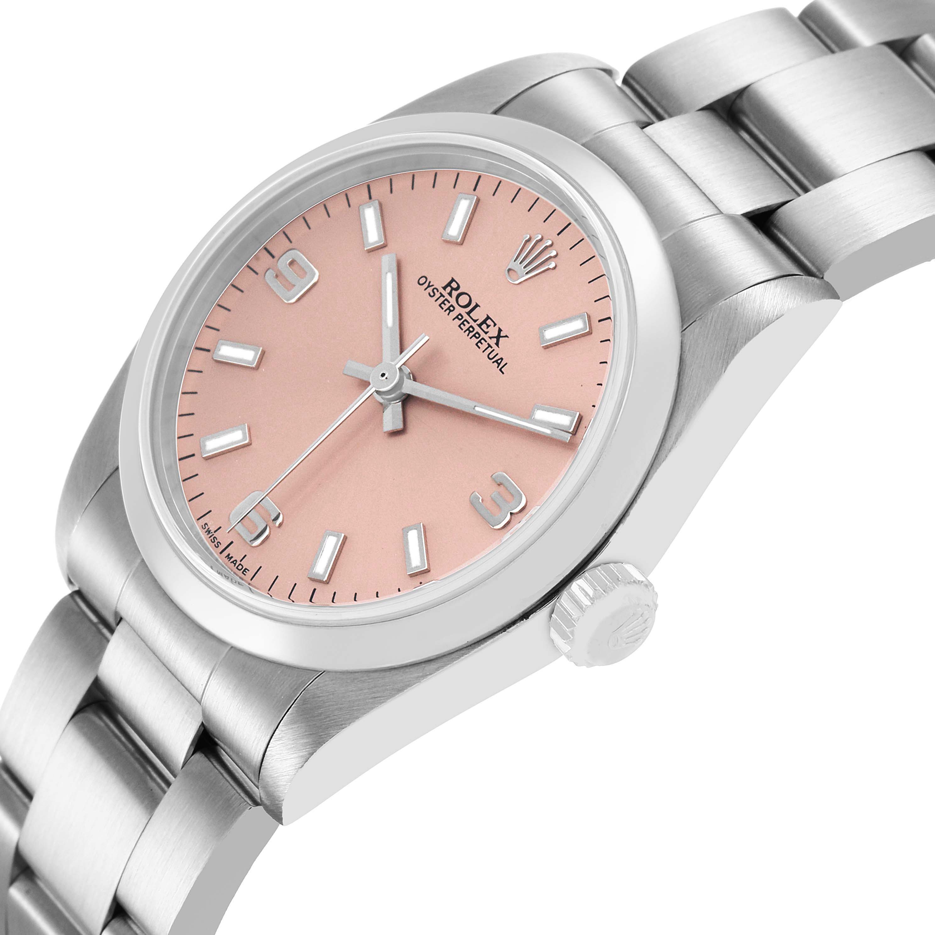 The Rolex Oyster Perpetual 77200 Women's Stainless Steel Pink Dial watch is shown at a slight angle, highlighting the dial, bezel, and bracelet.