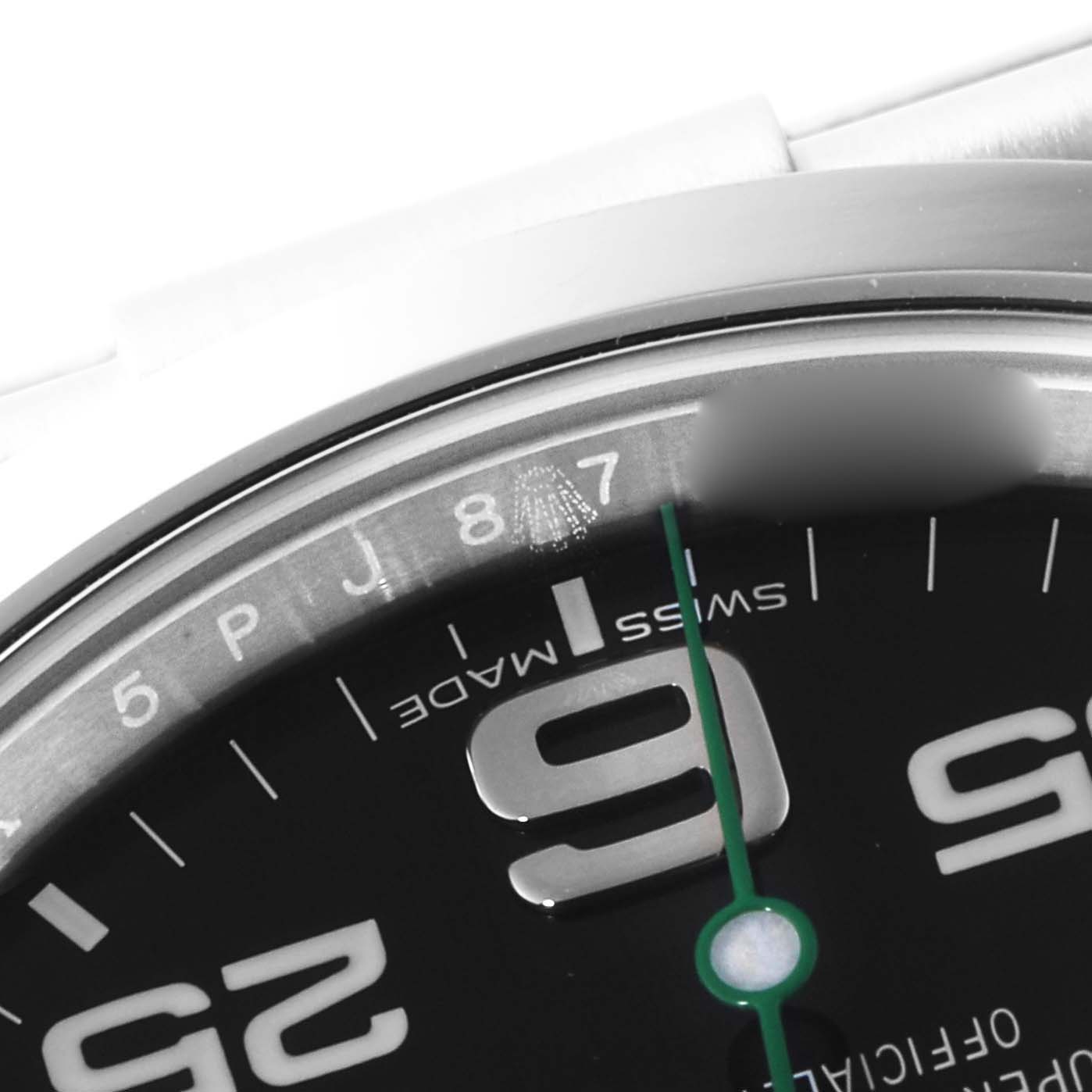 The image shows a close-up of the dial on a Rolex Air-King 116900 Men's Stainless Steel Black Dial 116900 Men's Stainless Steel Black Dial watch, focusing on the numbers and "Swiss Made" text.
