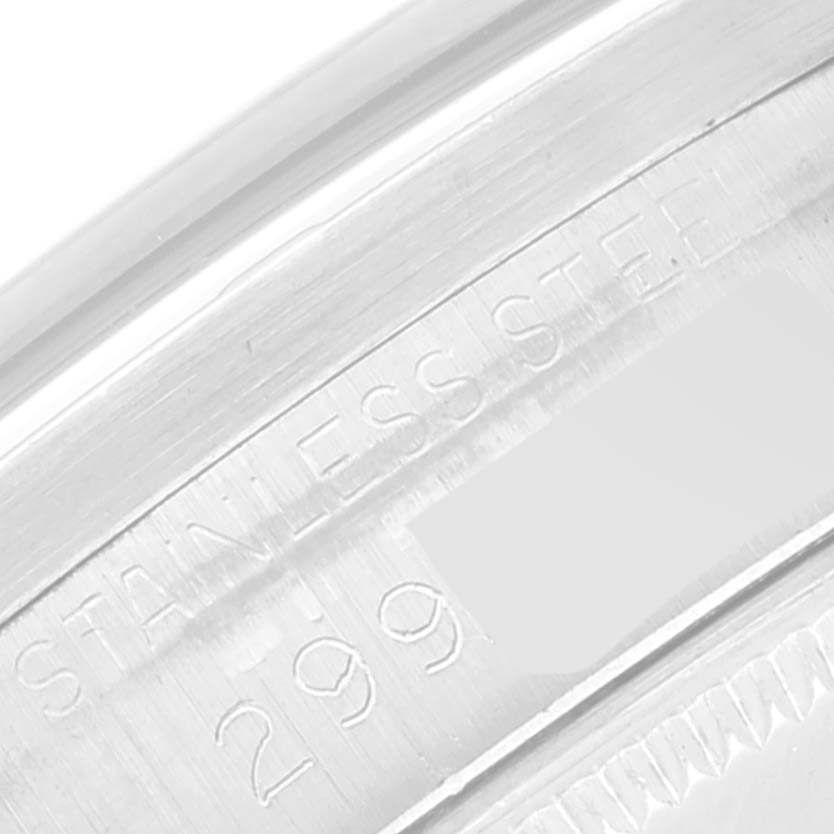This close-up of the Rolex Vintage Collection 1007 Men's Stainless Steel Silver Dial 1007 Men's Stainless Steel Silver Dial model shows its stainless steel case back with engraved markings.