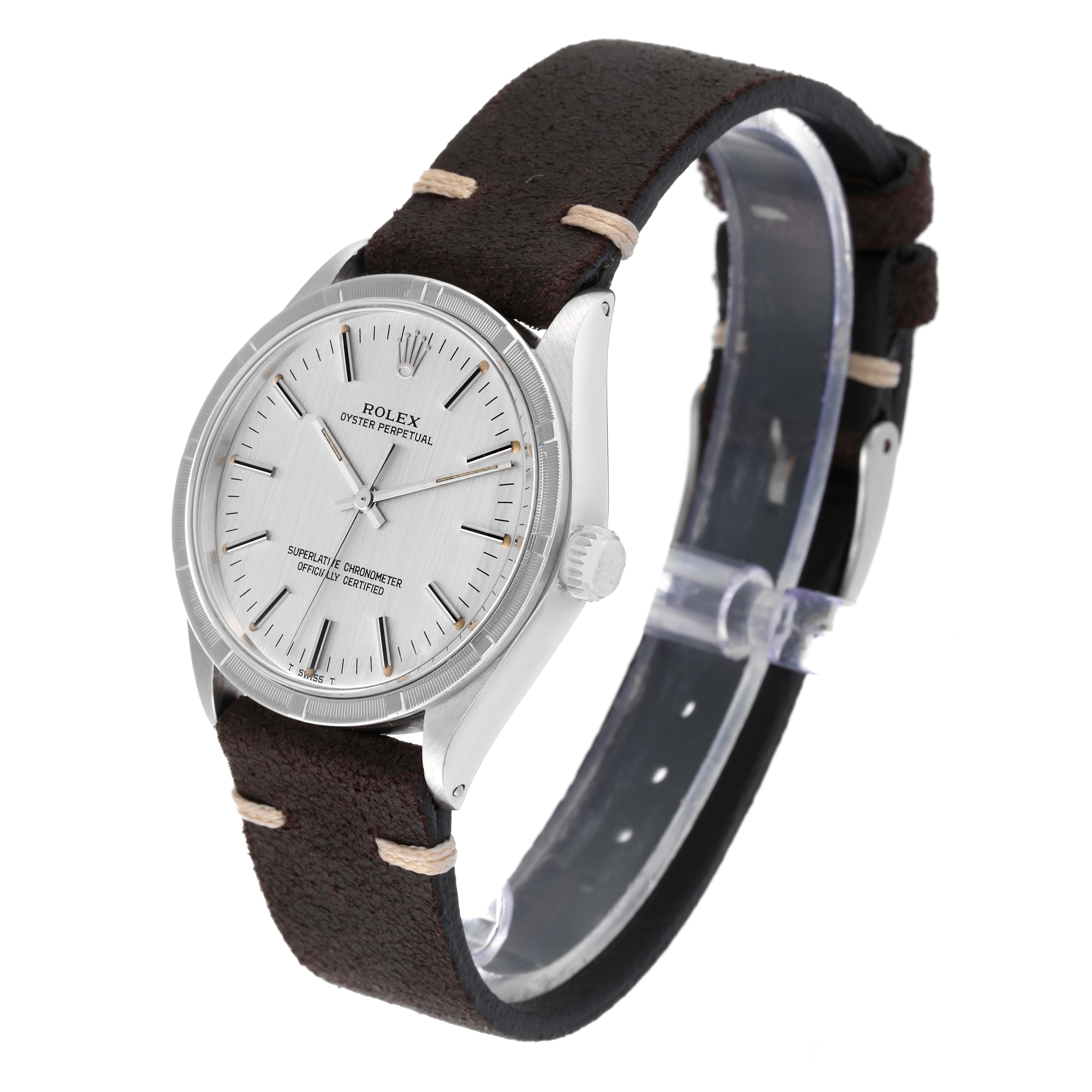 The image shows a Rolex Vintage Collection 1007 Men's Stainless Steel Silver Dial 1007 Men's Stainless Steel Silver Dial model watch featuring its face, case, crown, and leather strap at a slight angle.