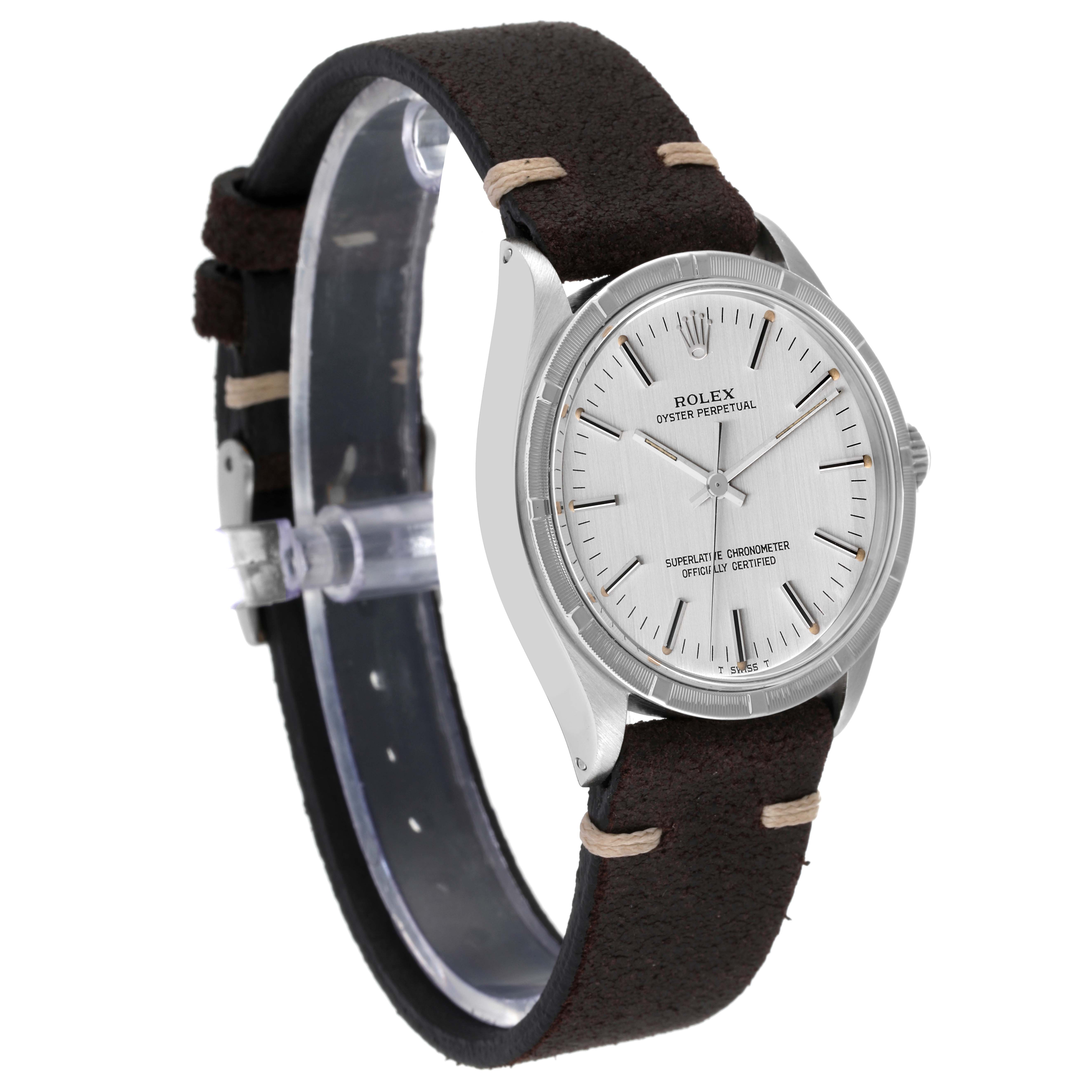 This image shows a Rolex Vintage Collection 1007 Men's Stainless Steel Silver Dial 1007 Men's Stainless Steel Silver Dial model watch, angled to display its face, bezel, and leather strap.