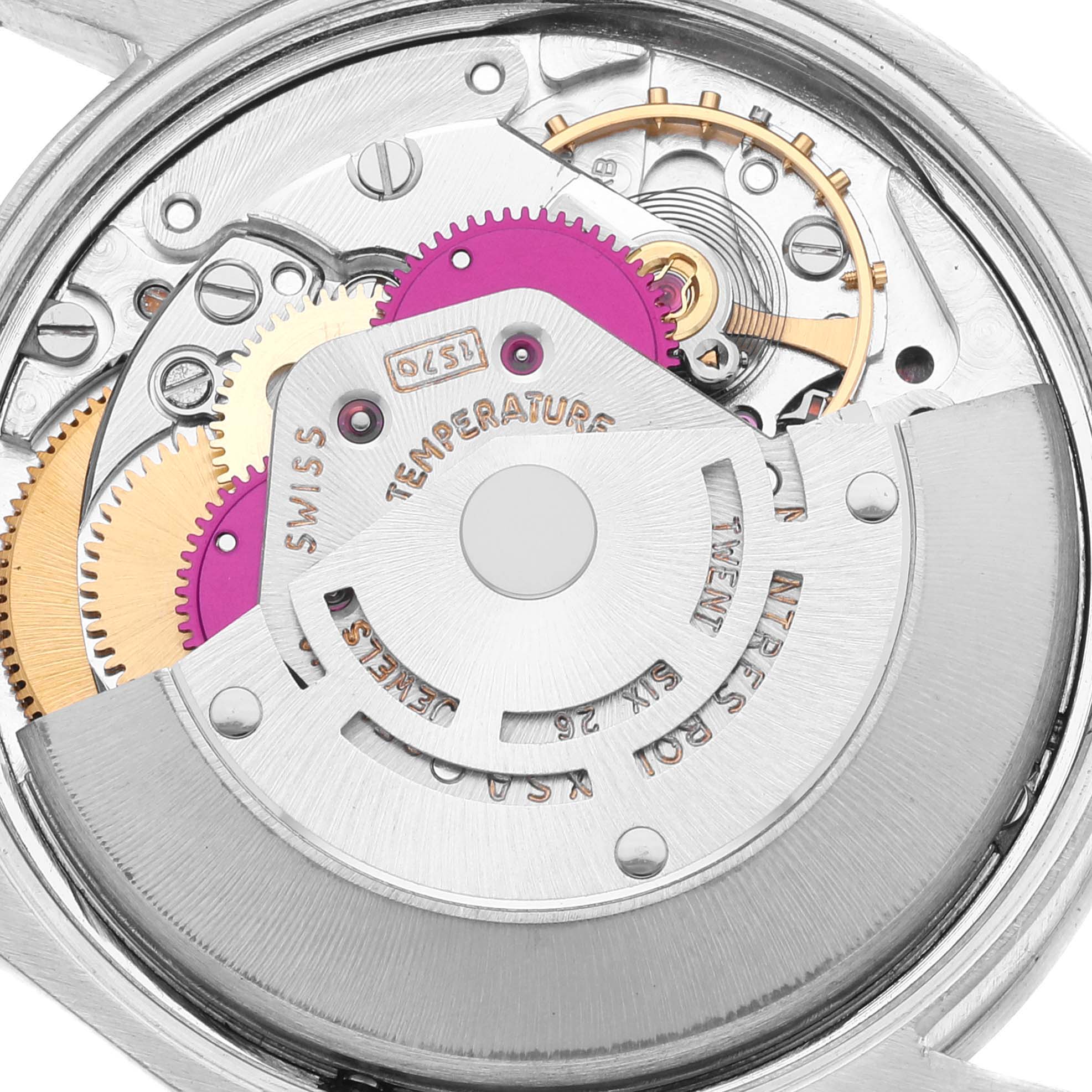 The image shows the intricate internal mechanism of a Vintage Collection Rolex watch from a close-up, top-down angle.