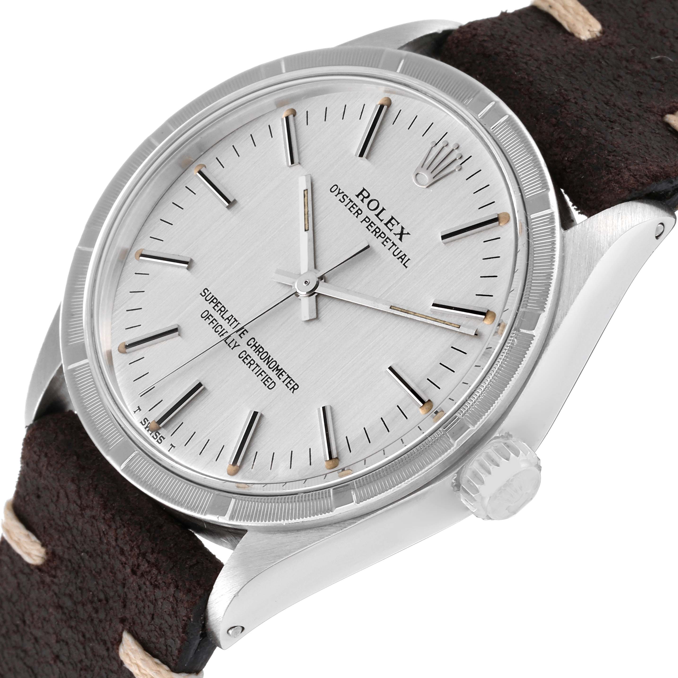 The image shows a close-up angle of the dial and bezel of a Vintage Collection Rolex Oyster Perpetual watch.