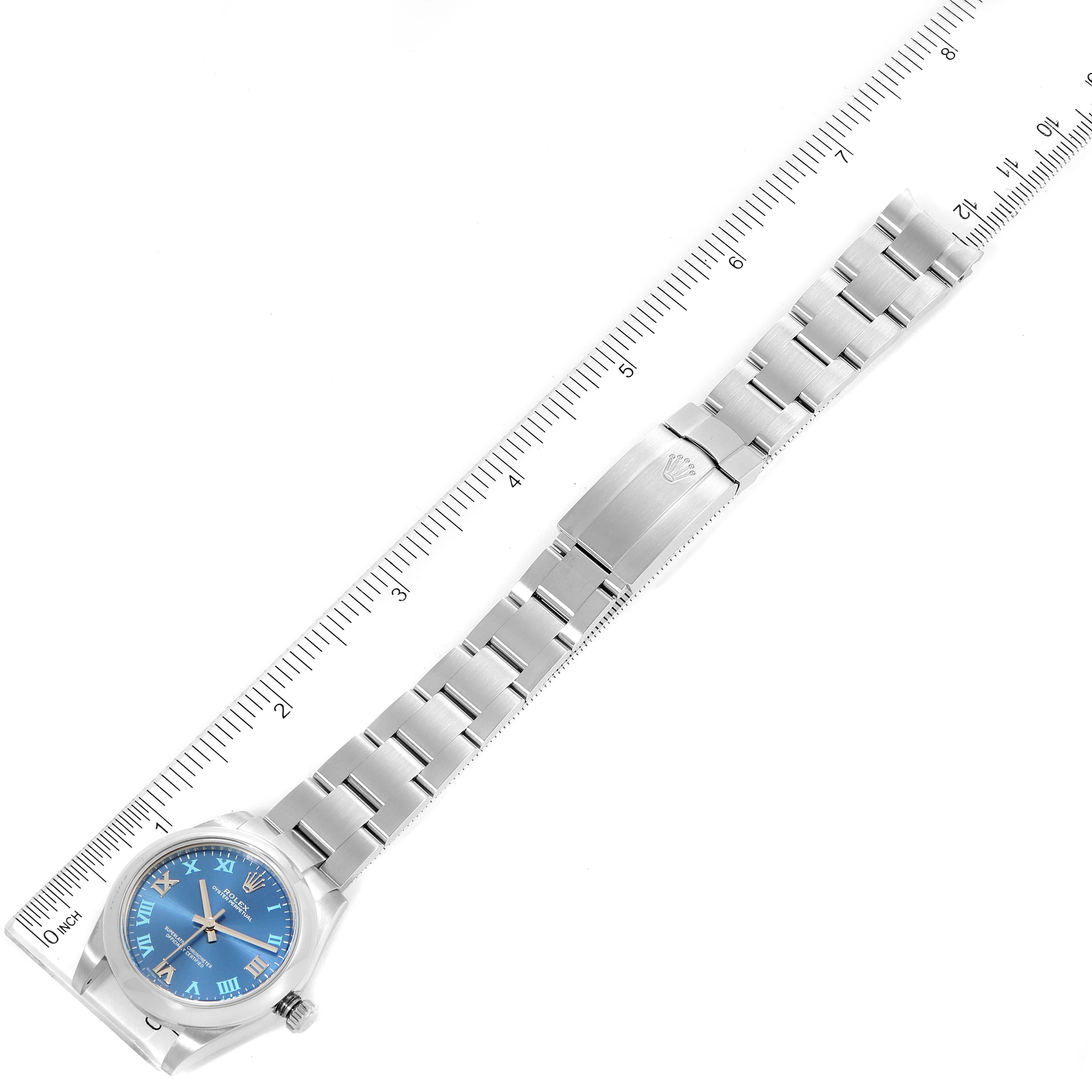 The image shows a top-down view of a Rolex Mid-Size 177200 Women
s Stainless Steel Blue Dial 177200 Women
s Stainless Steel Blue Dial watch, highlighting its bracelet, clasp, and blue dial.