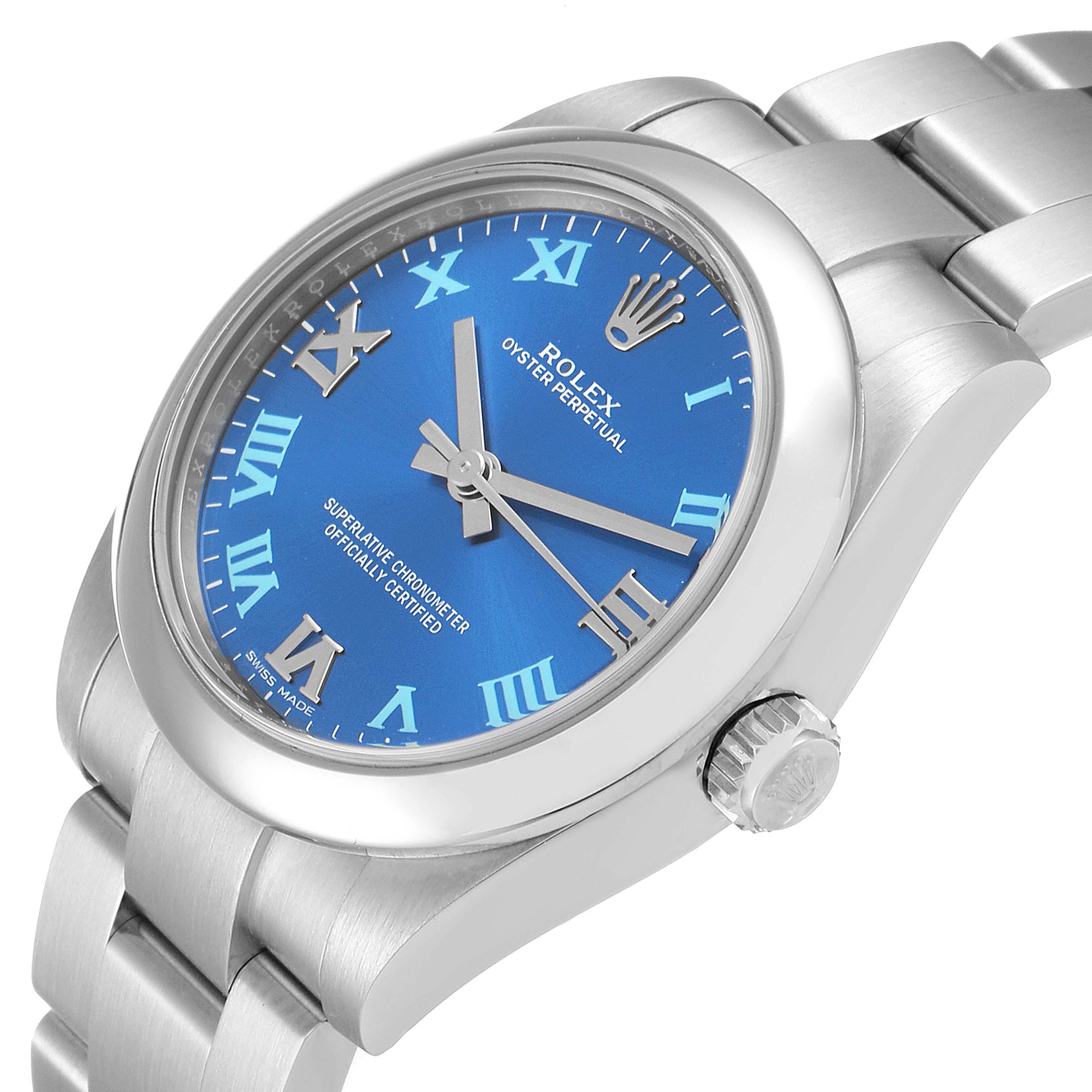The image shows a Rolex Oyster Perpetual Mid-Size watch from a tilted side angle, highlighting the blue dial, case, crown, and parts of the bracelet.