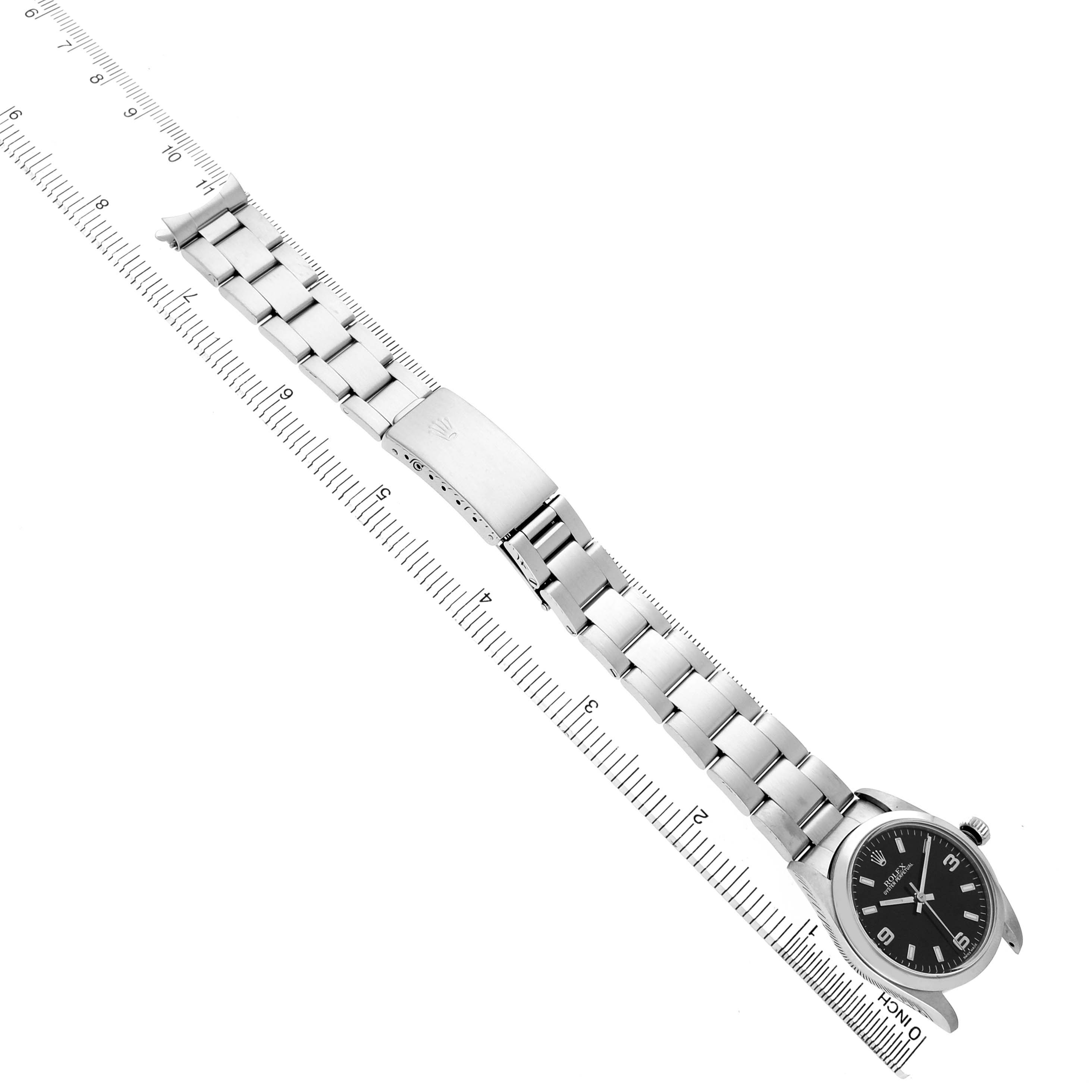 The Rolex Oyster Perpetual 77080 Women's Stainless Steel Black Dial watch is shown from a top view, displaying the full bracelet, clasp, and face.