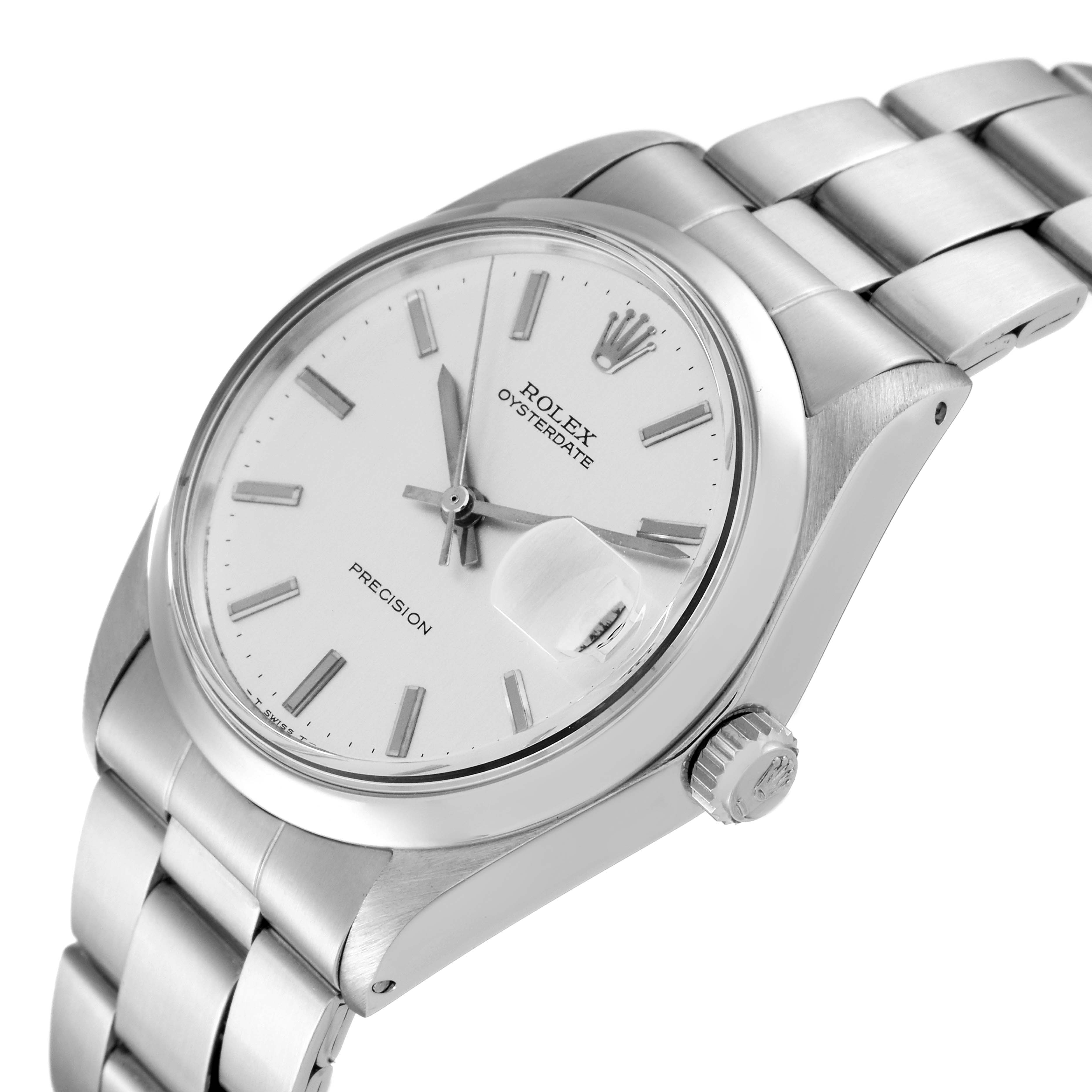 The Vintage Collection Rolex Oysterdate watch is shown at an angled view, displaying the face, crown, and part of the bracelet.