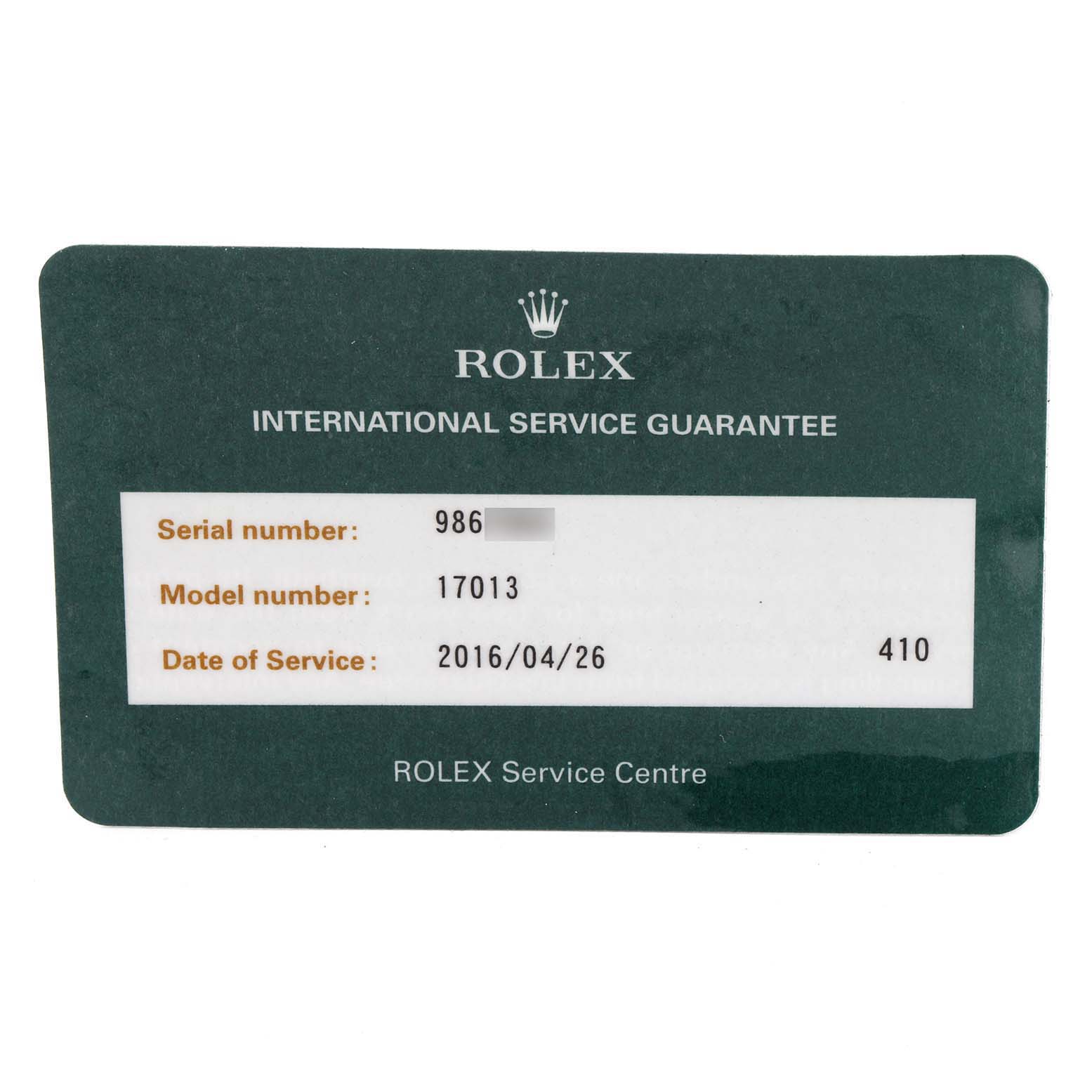 This image shows a Rolex International Service Guarantee card for the Oysterquartz model 17013.