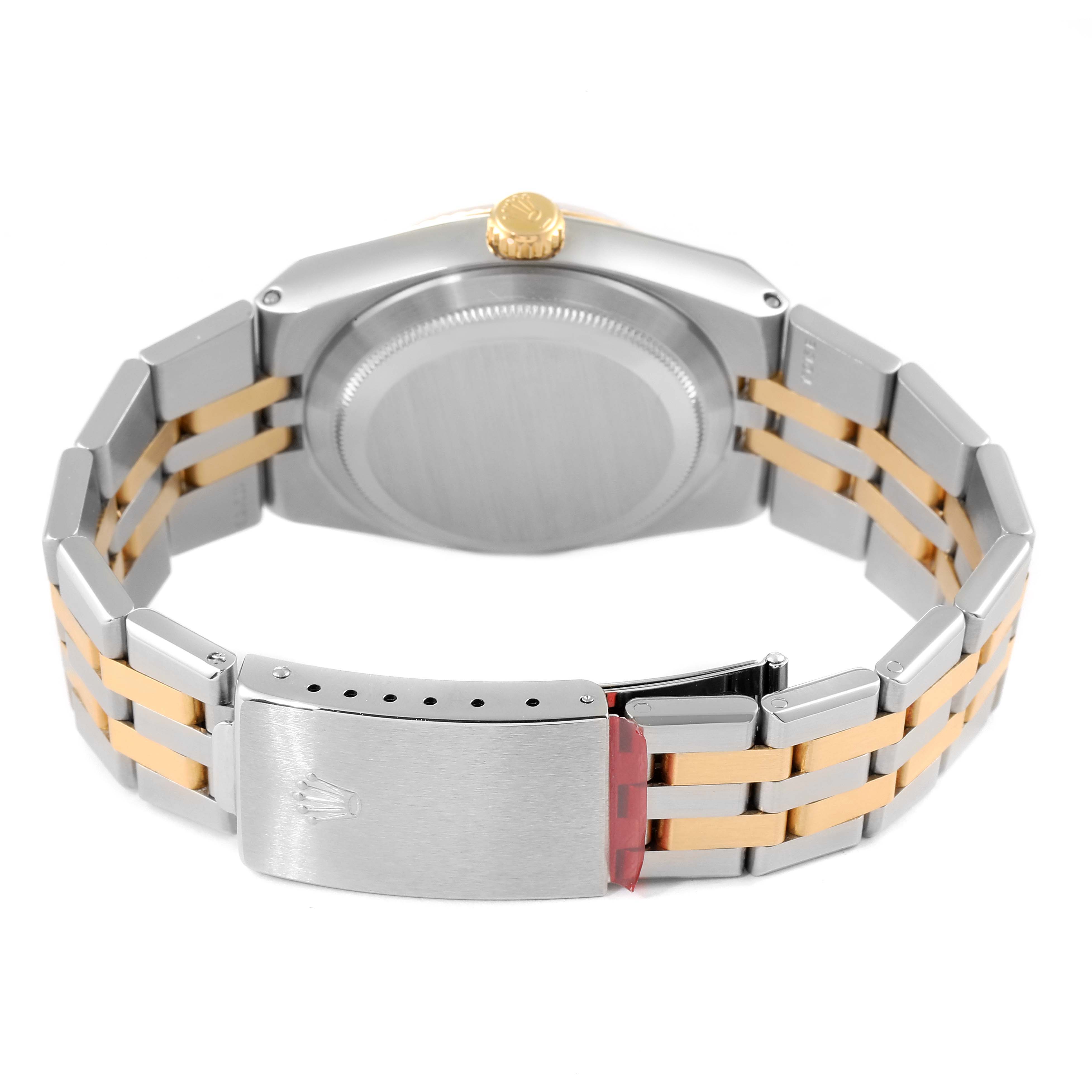 The image shows the back of the Rolex Oysterquartz 17013 Men's Steel and Gold (two tone) Champagne Dial 17013 Men's Steel and Gold (two tone) Champagne Dial watch, highlighting the case and two-tone bracelet with clasp.