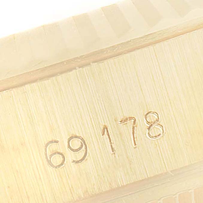 The image shows a close-up view of the case with the model number "69178" engraved on a Rolex President 69178 Women
s Yellow Gold Champagne Dial 69178 Women
s Yellow Gold Champagne Dial watch.
