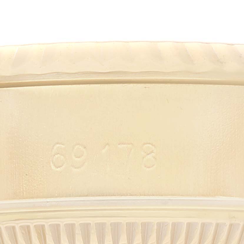 This image shows a close-up of the reference number "69178" engraved on the case of a Rolex President 69178 Women's Yellow Gold Blue Dial 69178 Women's Yellow Gold Blue Dial model watch.