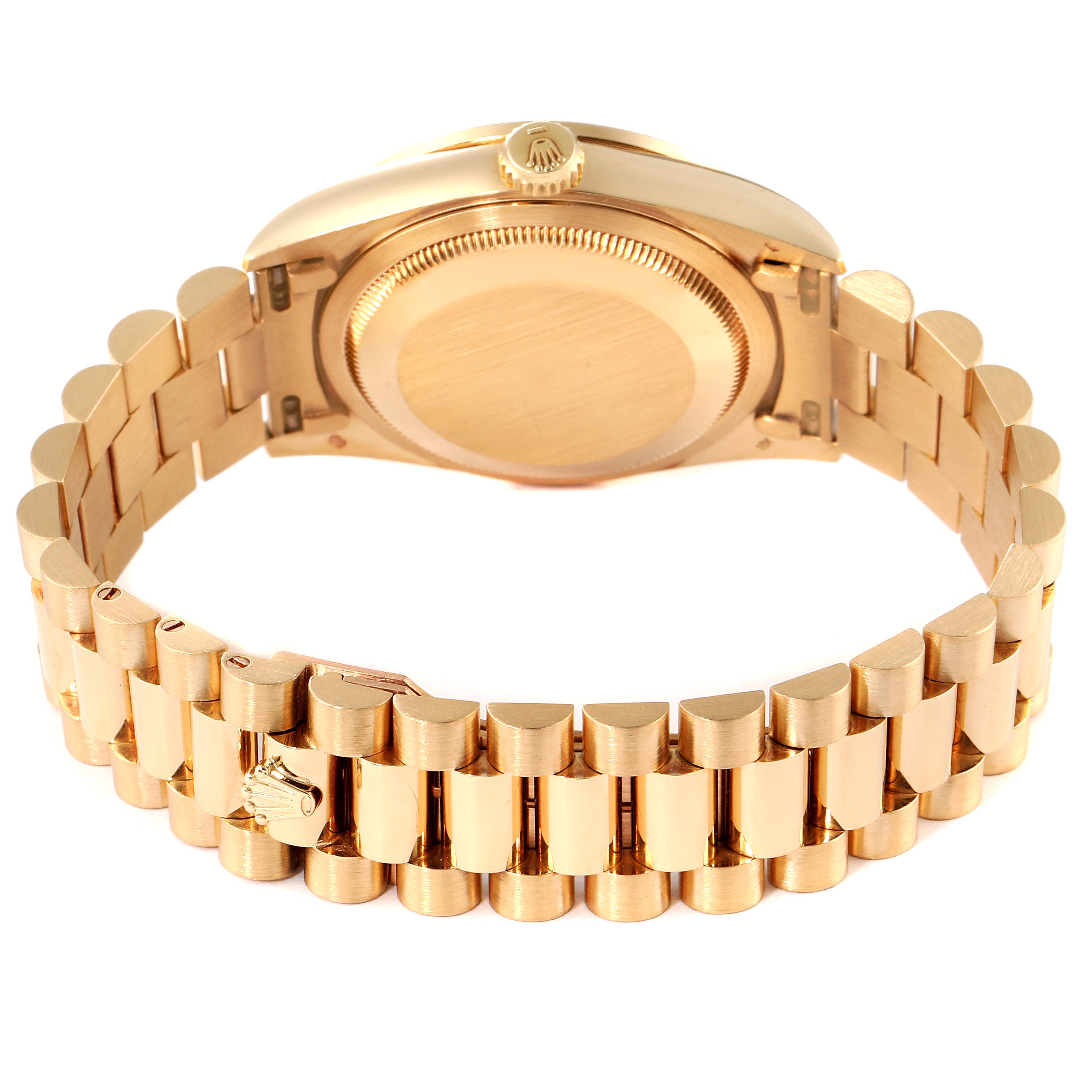 This image shows the back casing and bracelet of a Rolex President 18338 Men
s Yellow Gold Champagne Dial 18338 Men
s Yellow Gold Champagne Dial model watch.