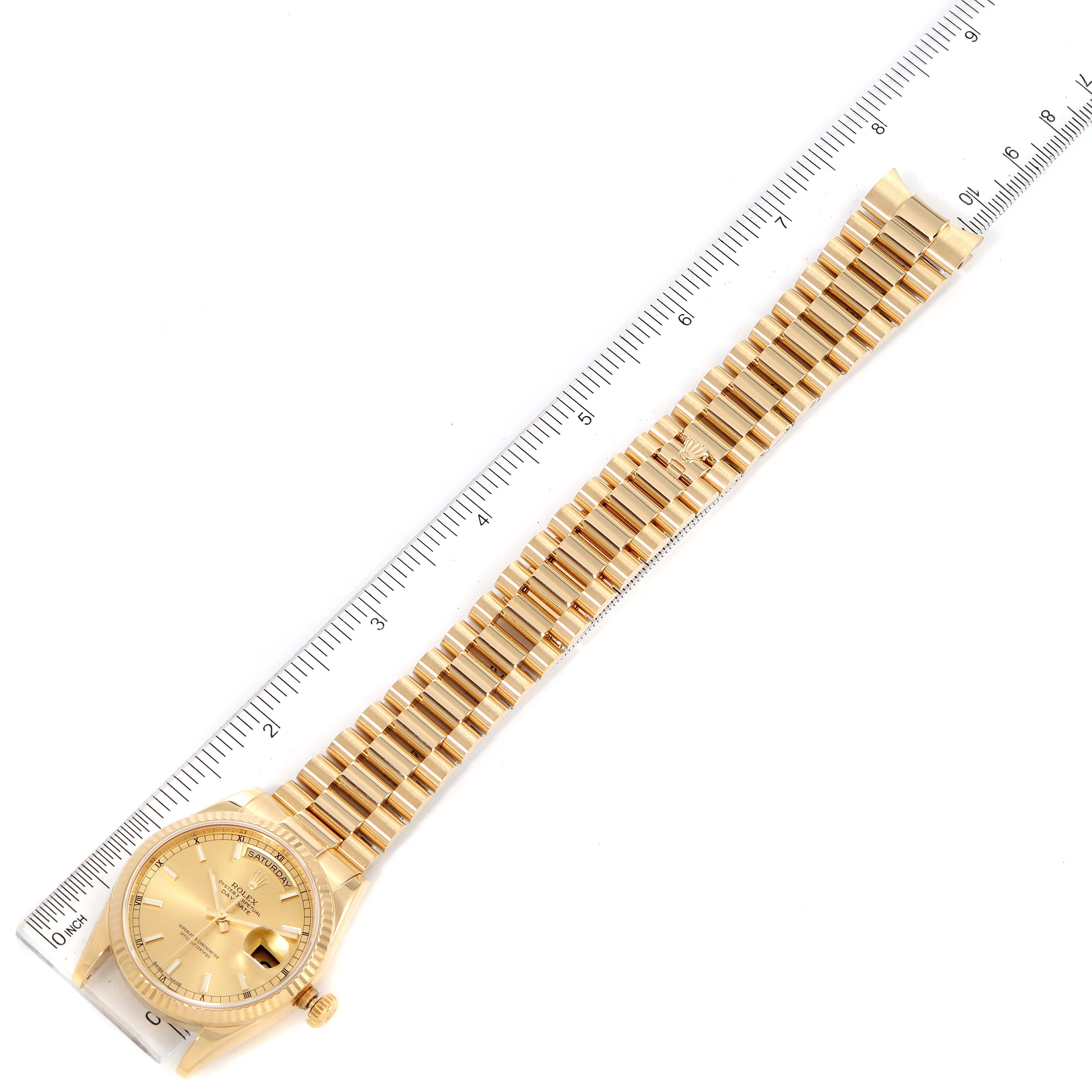 The Rolex President 118238 Men's Yellow Gold Champagne Dial 118238 Men's Yellow Gold Champagne Dial model watch is shown from the top view, highlighting its full band, dial, and bezel.