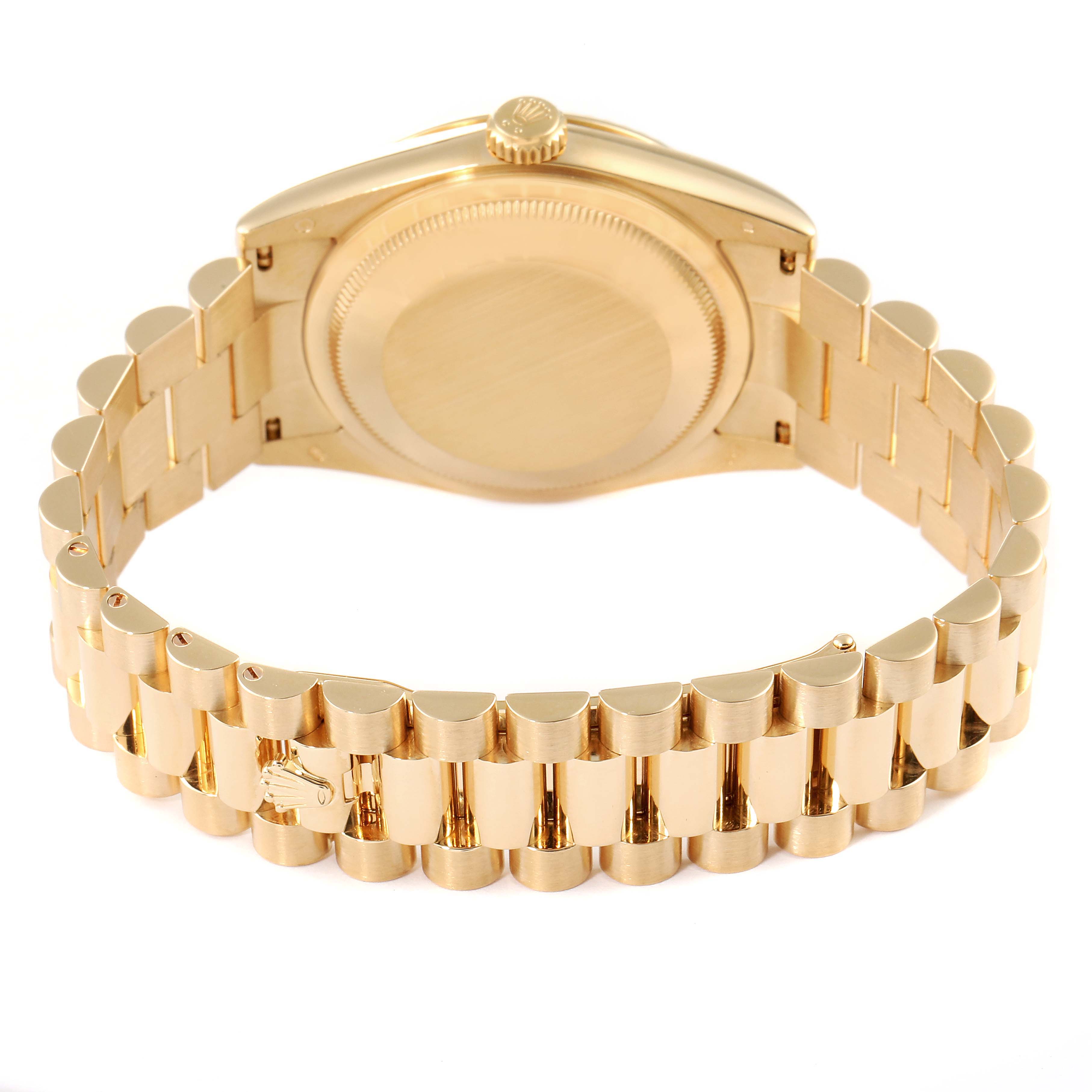 This image shows the back and bracelet of a Rolex President 118238 Men's Yellow Gold Champagne Dial 118238 Men's Yellow Gold Champagne Dial model watch, focusing on the gold links and case back.