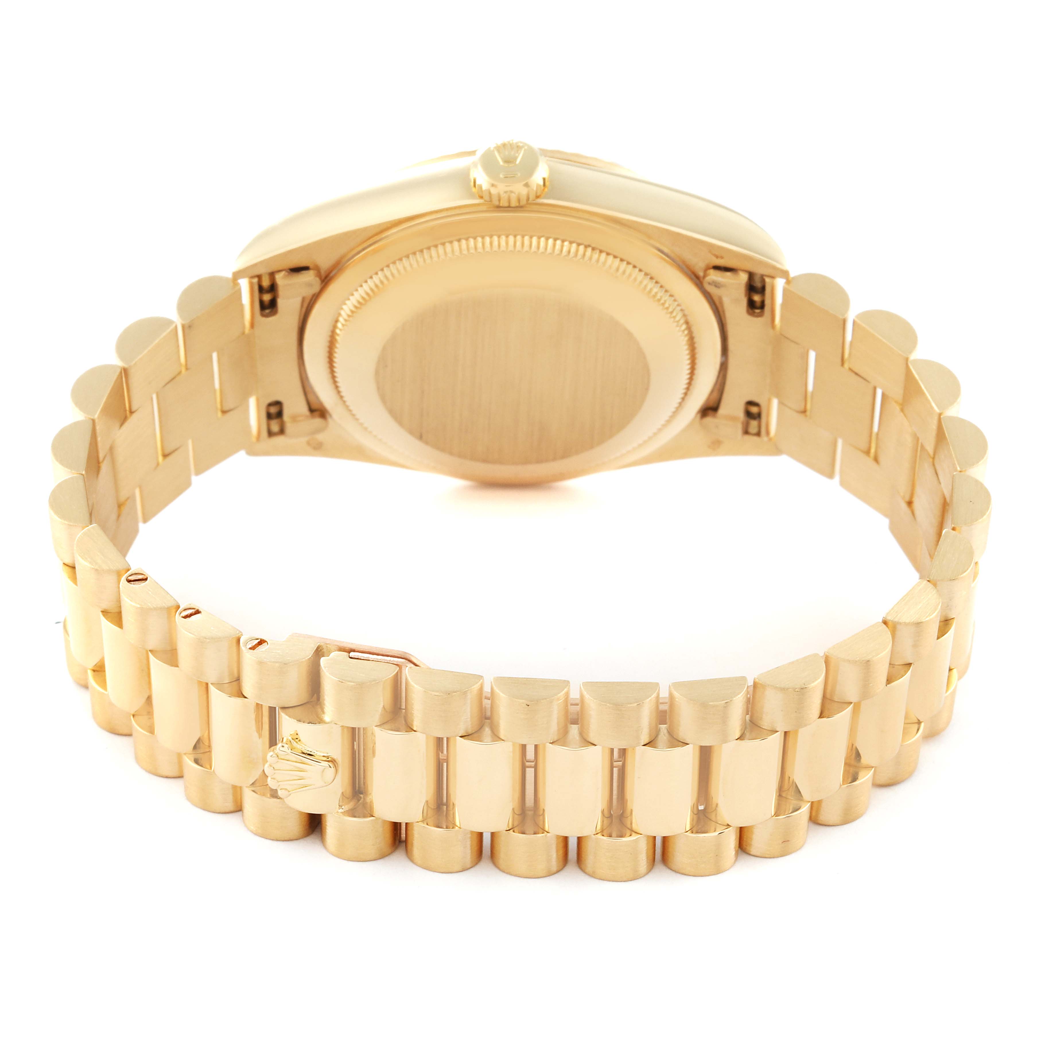 This image shows a President model Rolex watch from the back, highlighting the case back and gold bracelet.