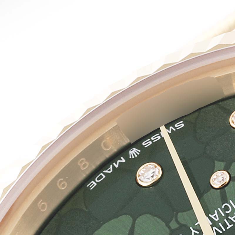 The image shows a close-up angle of the dial and bezel of the Rolex President 278278 Women
s Yellow Gold Green Dial 278278 Women
s Yellow Gold Green Dial model watch.