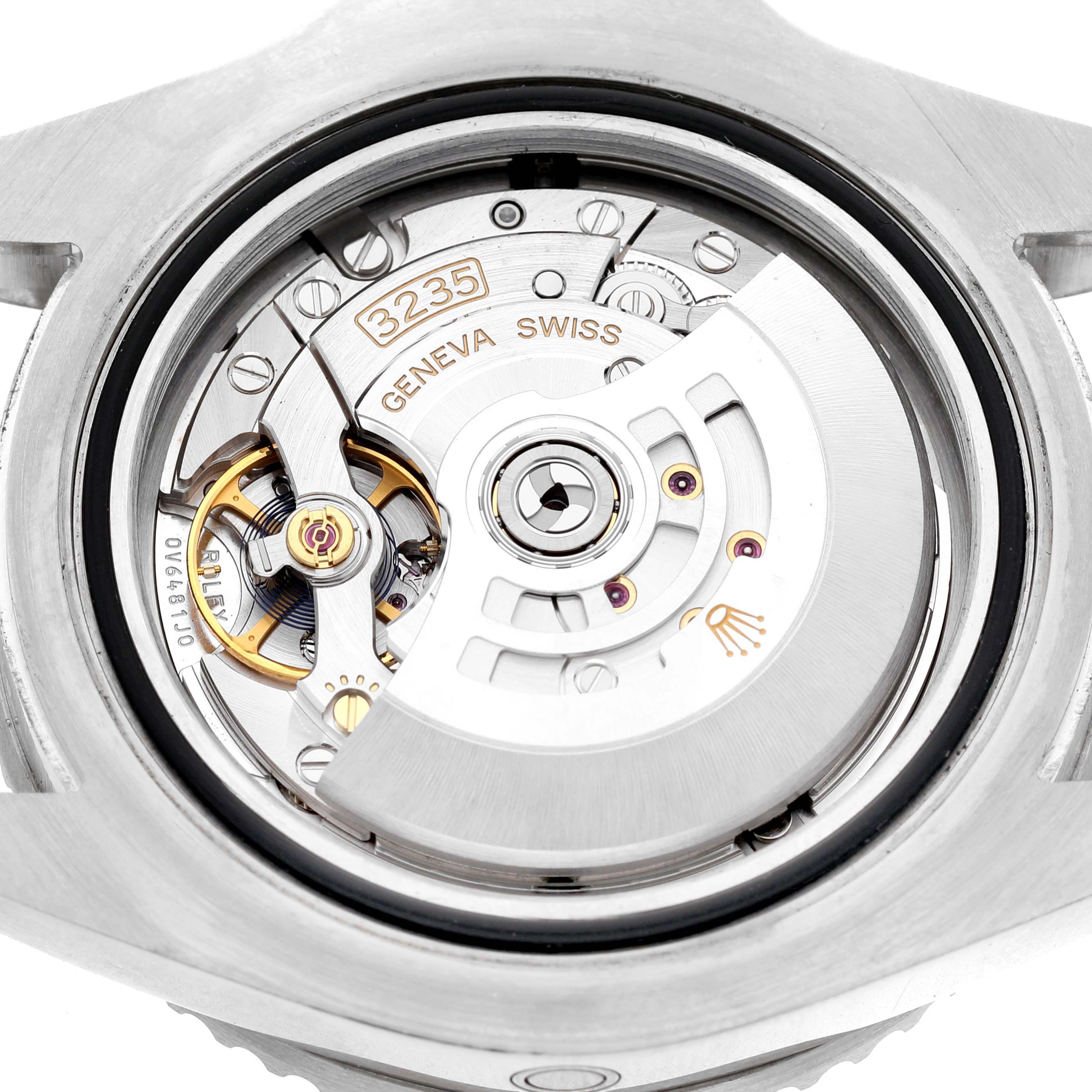 The image shows the movement of the Rolex Sea-Dweller 126600 Men's Stainless Steel Black Dial, highlighting the intricate inner mechanism.