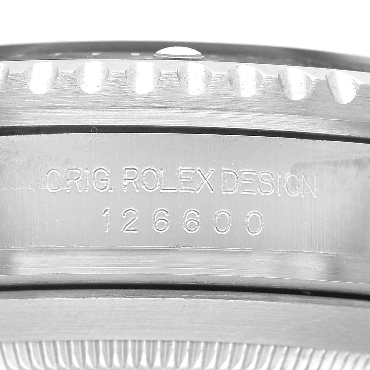 The image shows a close-up of the engraved model number "126600" on the side of a Rolex Sea-Dweller 126600 Men's Stainless Steel Black Dial watch case.