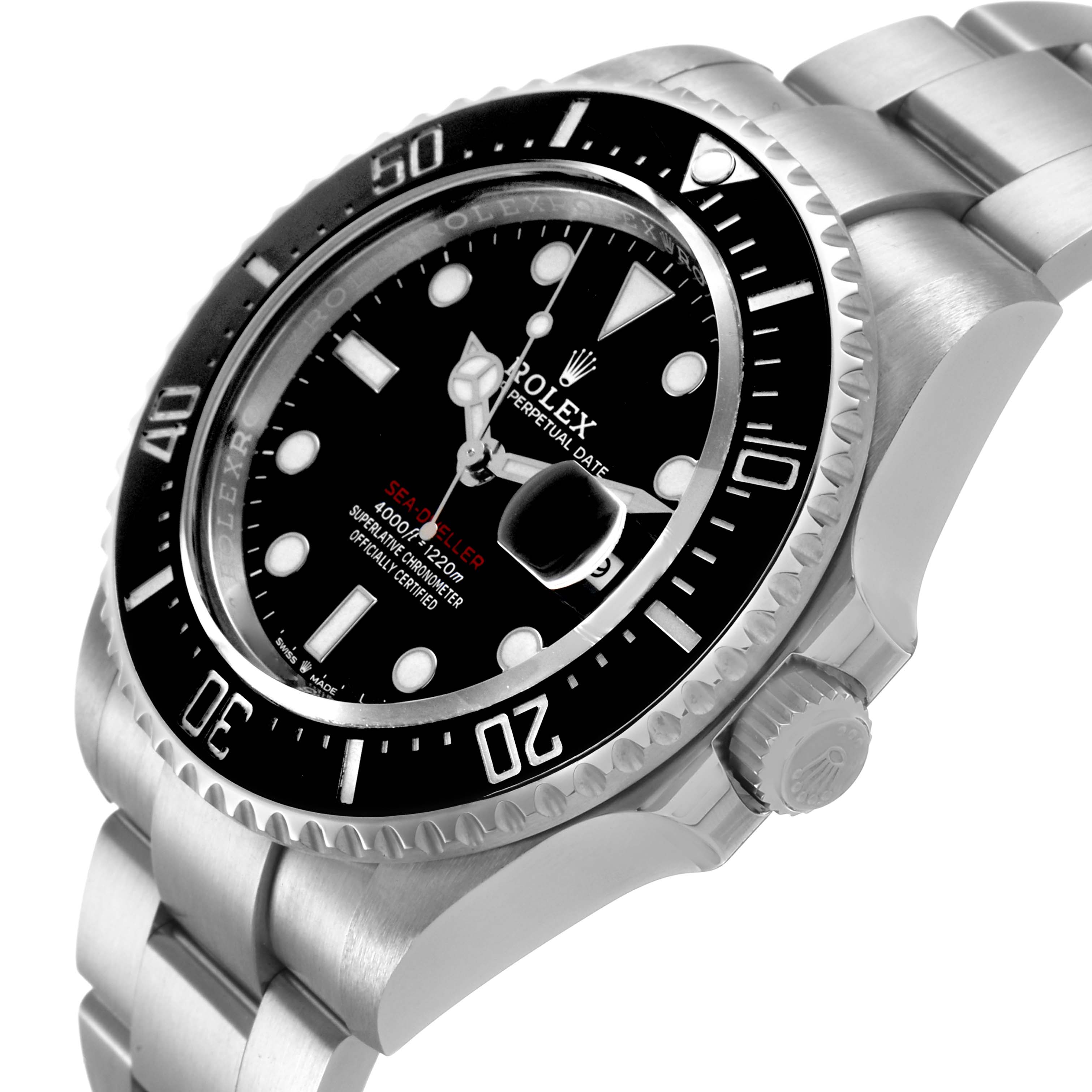 The Rolex Sea-Dweller 126600 Men's Stainless Steel Black Dial is shown in a side angle highlighting the bezel, dial, crown, and bracelet.