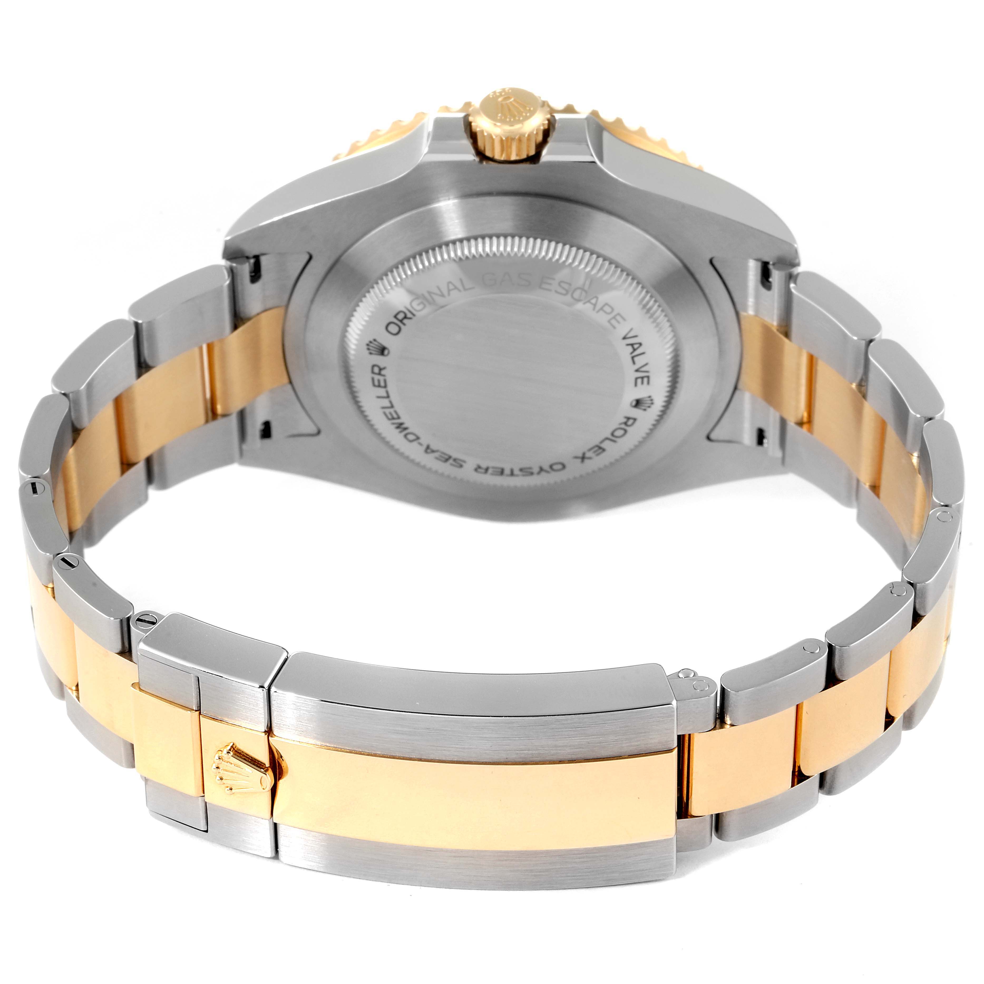 The image shows the back casing and two-tone bracelet of the Rolex Sea-Dweller 126603 Men's Steel and Gold (two tone) Black Dial 126603 Men's Steel and Gold (two tone) Black Dial watch.