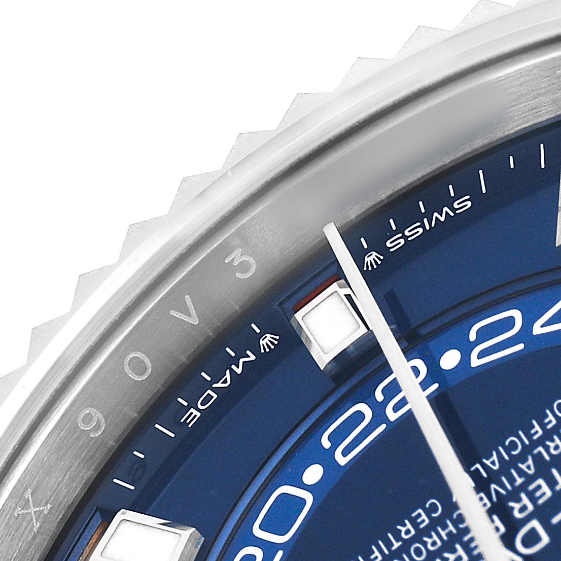The image shows a close-up of the Rolex Sky-Dweller 336934 Men's Stainless Steel Blue Dial watch's blue dial, bezel, and part of an index marker.