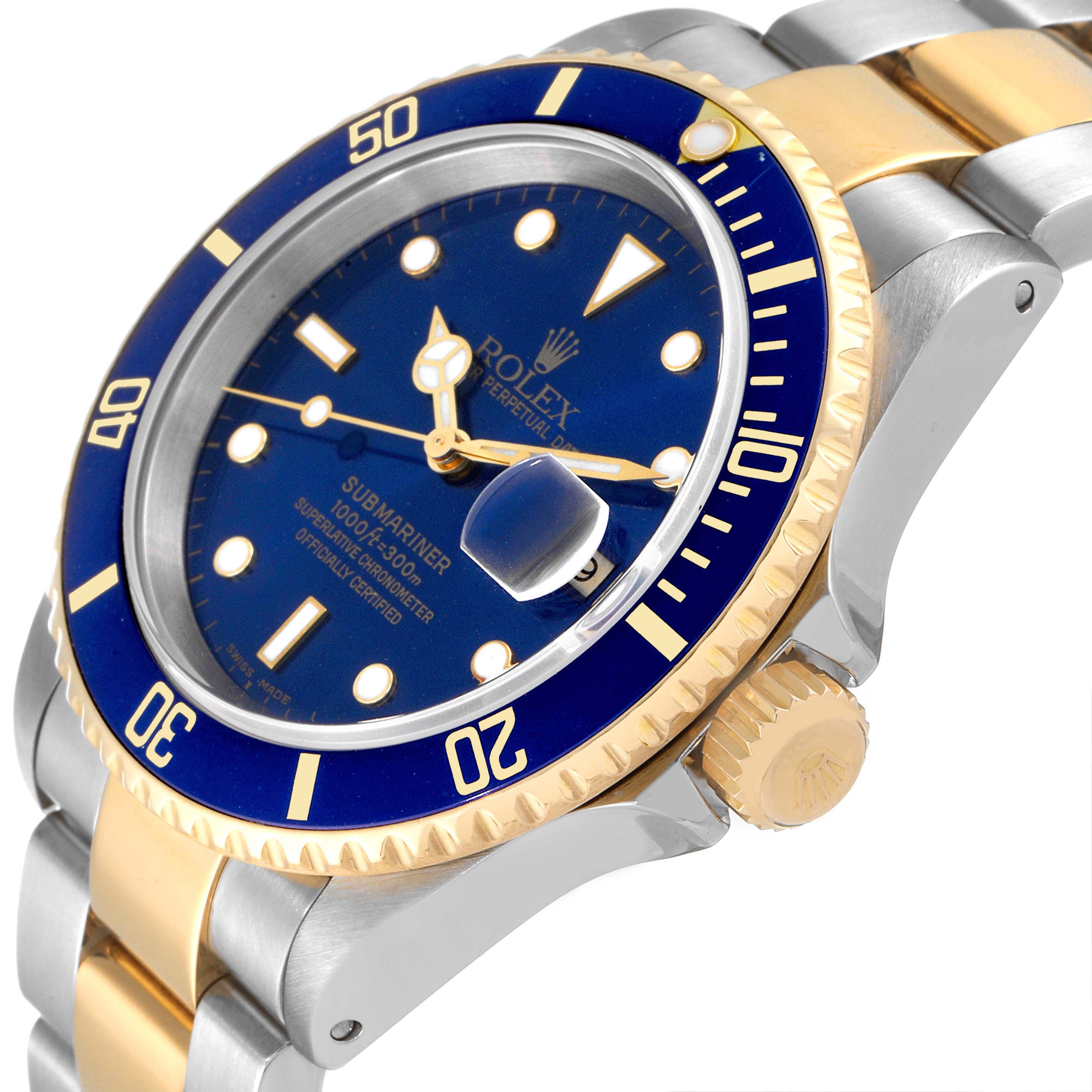 The image shows a close-up angle of the face, bezel, crown, and part of the bracelet of a Rolex Submariner 16613 Men's Steel and Gold (two tone) Blue Dial 16613 Men's Steel and Gold (two tone) Blue Dial watch.
