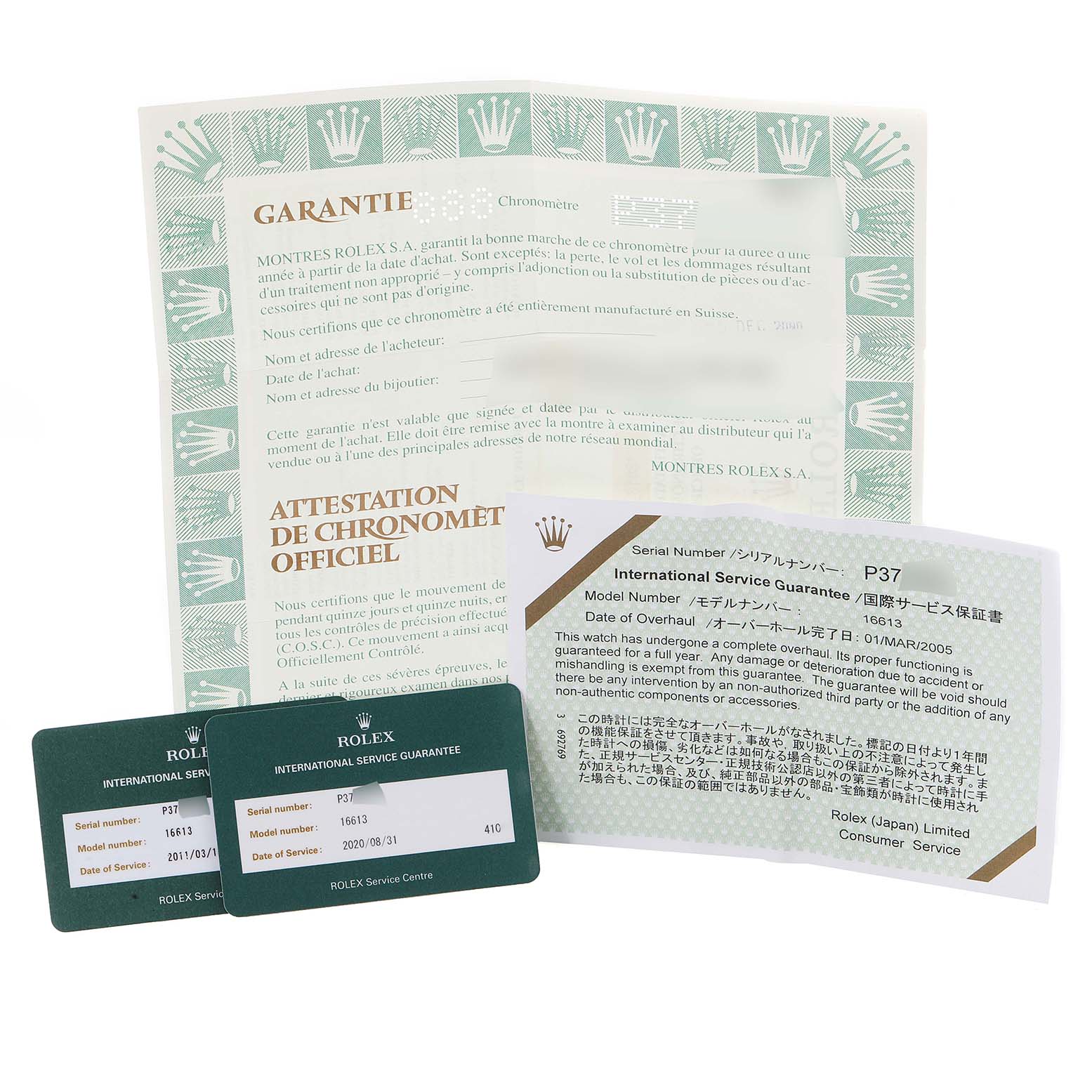 The image shows the warranty cards and official chronometer certification documents for the Rolex Submariner 16613 Men's Steel and Gold (two tone) Blue Dial 16613 Men's Steel and Gold (two tone) Blue Dial model.