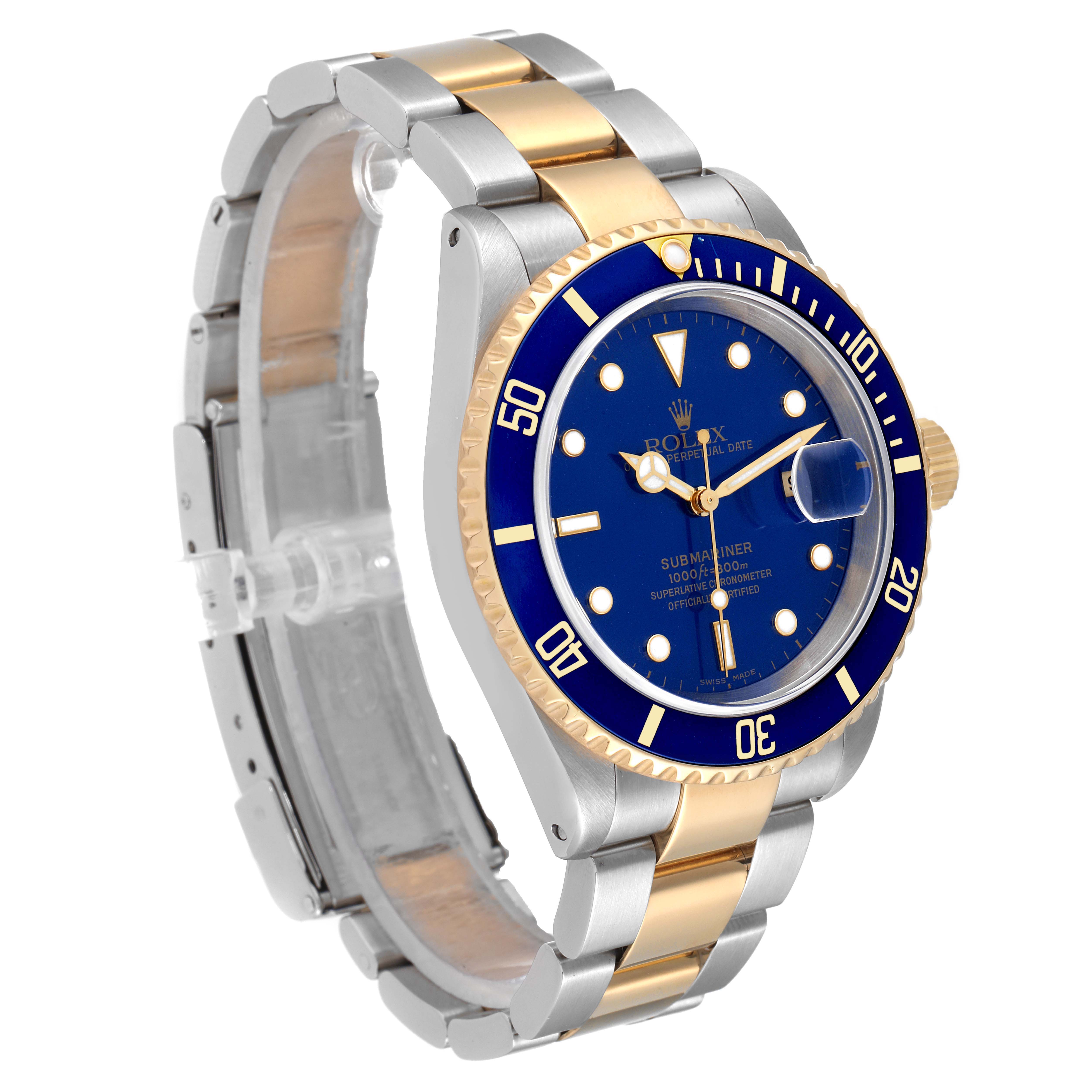 The Rolex Submariner 16613 Men's Steel and Gold (two tone) Blue Dial 16613 Men's Steel and Gold (two tone) Blue Dial watch is shown at a three-quarter angle, displaying the watch face, bezel, crown, and bracelet.
