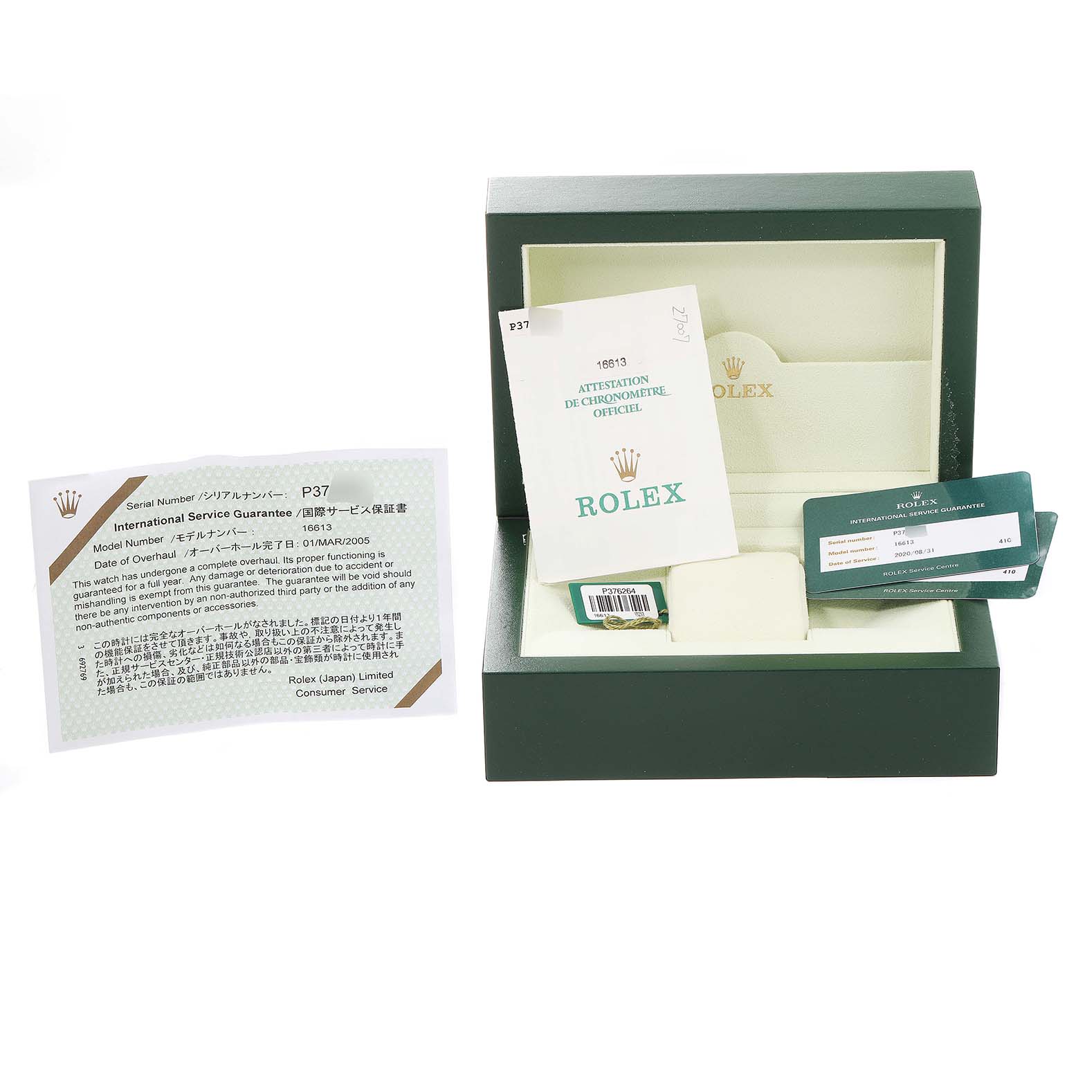 The image shows the box and accessories for a Rolex Submariner 16613 Men's Steel and Gold (two tone) Blue Dial 16613 Men's Steel and Gold (two tone) Blue Dial, including warranty cards, manual, and an empty watch cushion.