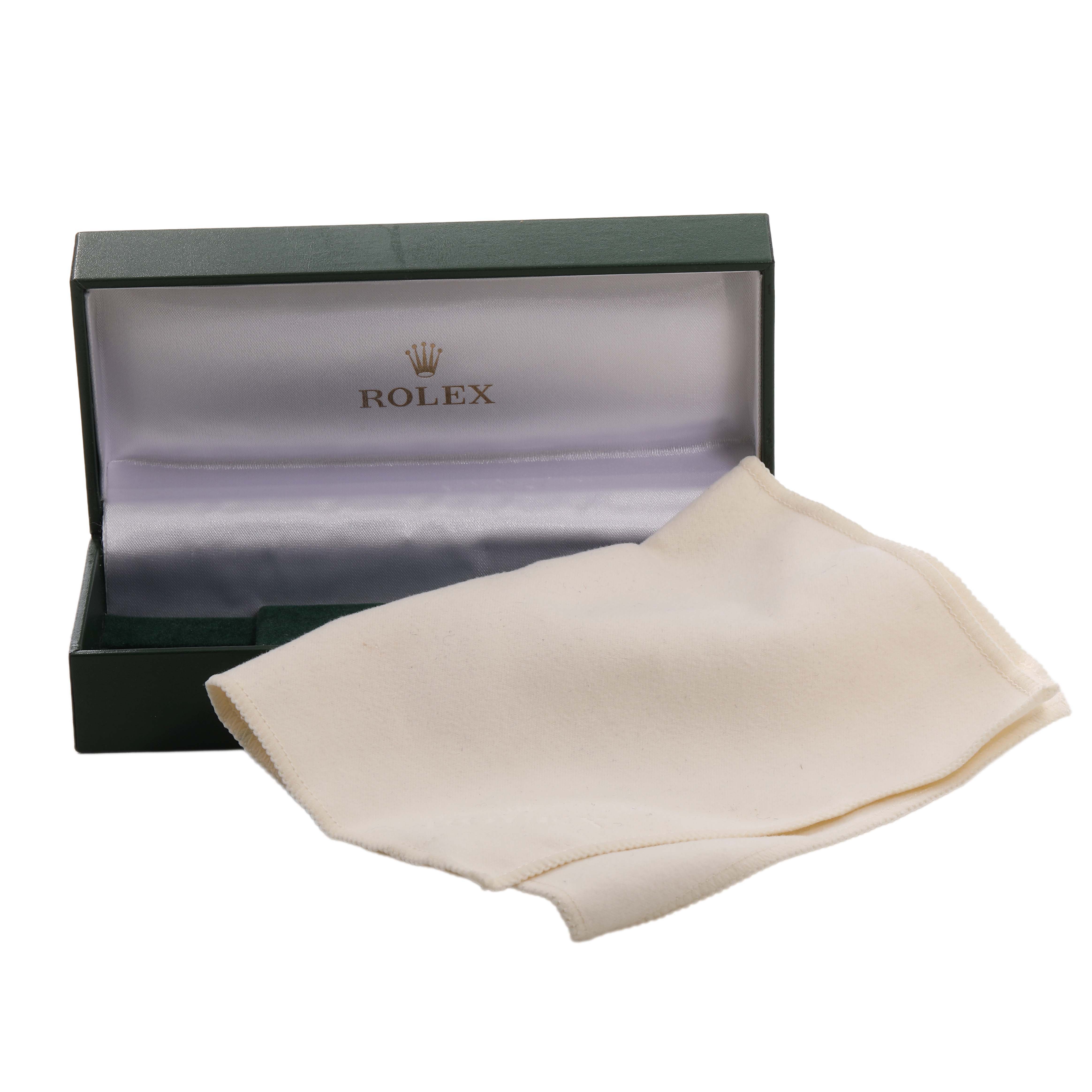The image shows an open Rolex Submariner 16800 Men's Stainless Steel Black Dial watch box and a cleaning cloth, with a frontal view of the box interior.