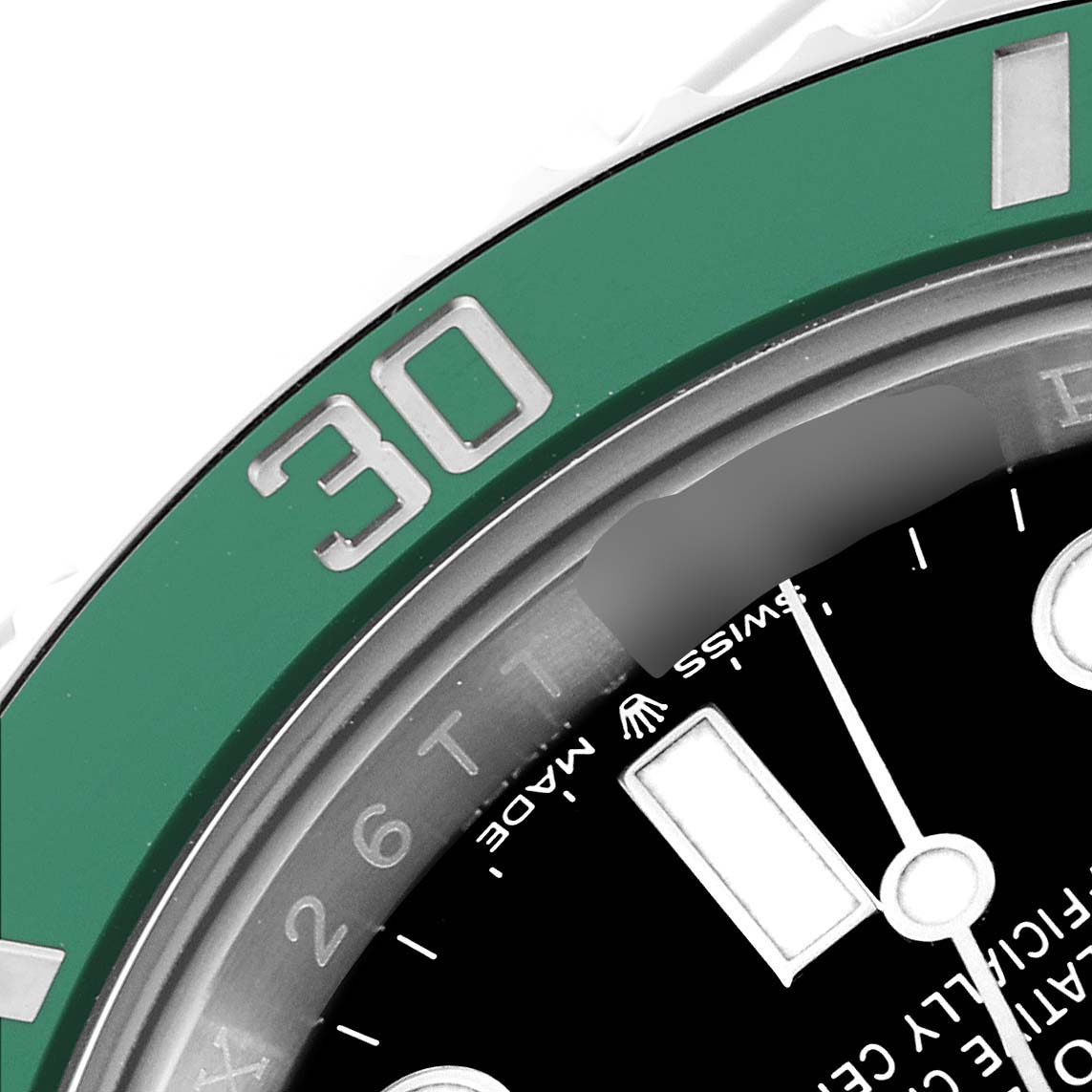 This image shows a close-up of the bezel, part of the dial, and the minute hand of a Rolex Submariner 126610LV Men
s Stainless Steel Black Dial 126610LV Men
s Stainless Steel Black Dial watch.