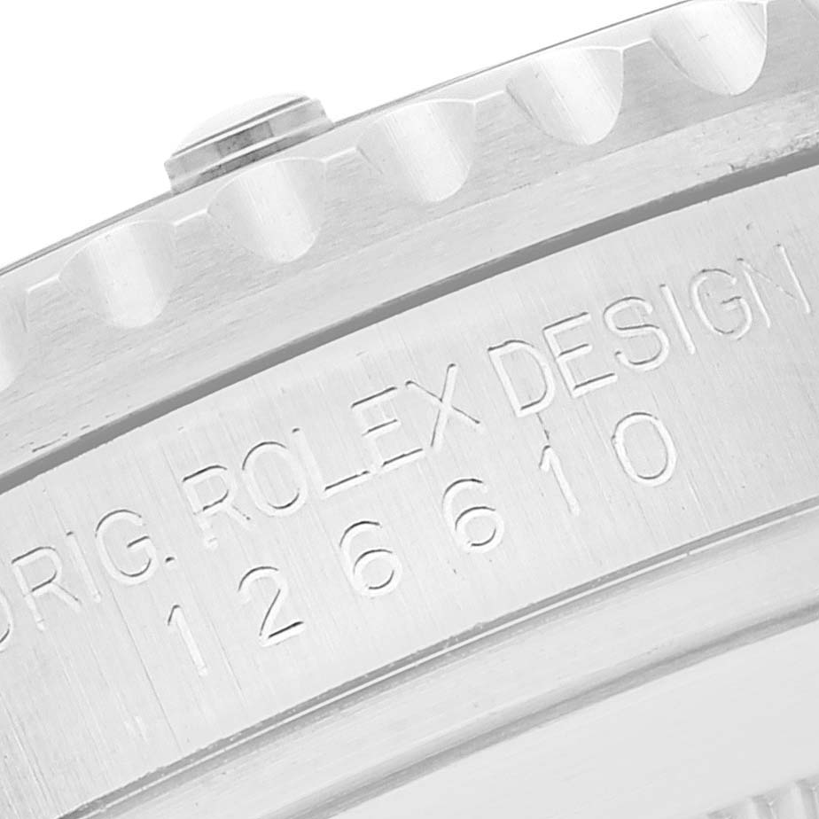 The image shows a close-up of the inner case back and reference number "126610" of a Rolex Submariner 126610LV Men
s Stainless Steel Black Dial 126610LV Men
s Stainless Steel Black Dial watch.