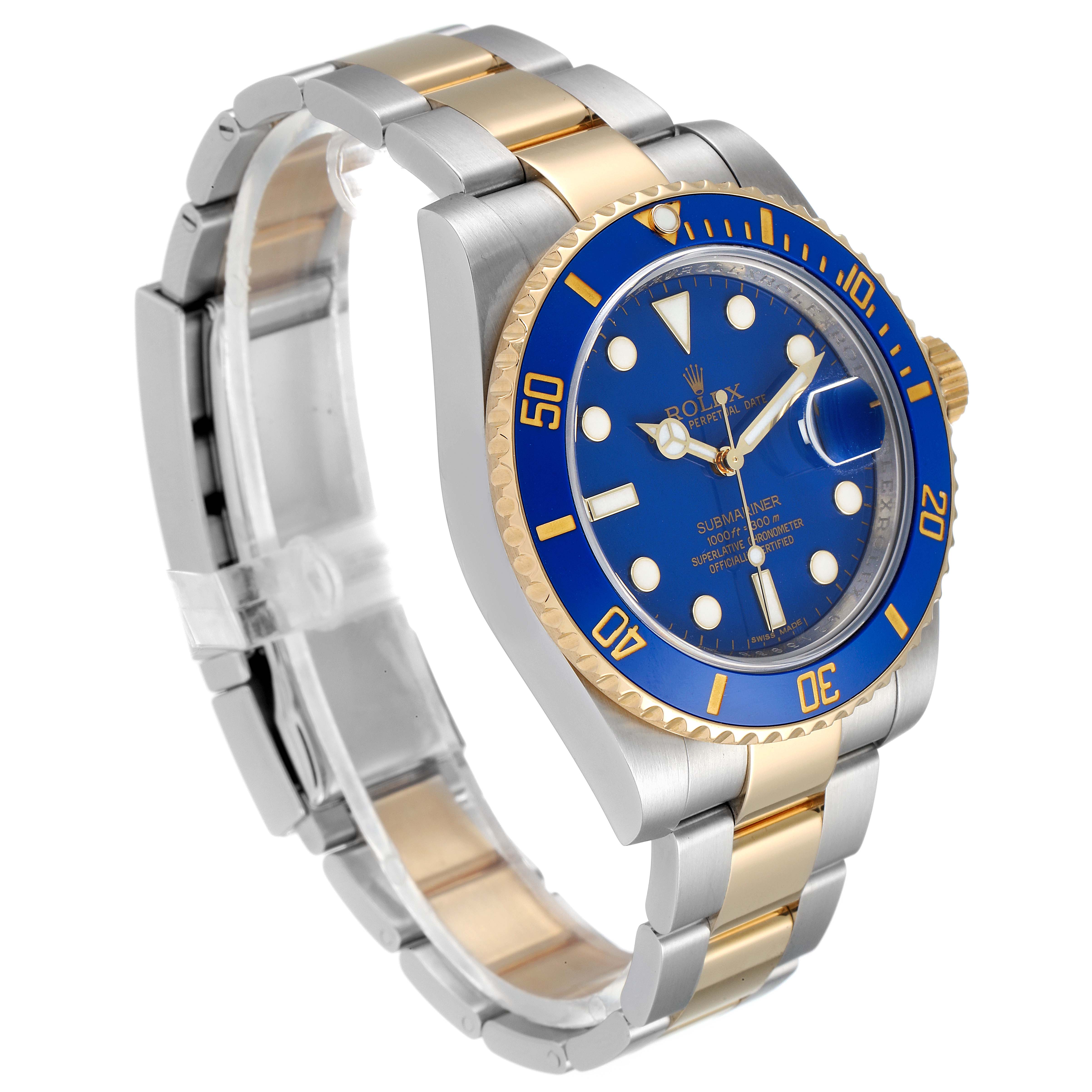 The image shows a Rolex Submariner 116613 Men
s Steel and Gold (two tone) Blue Dial 116613 Men
s Steel and Gold (two tone) Blue Dial watch angled from the upper left, displaying the blue dial, bezel, and two-tone bracelet.