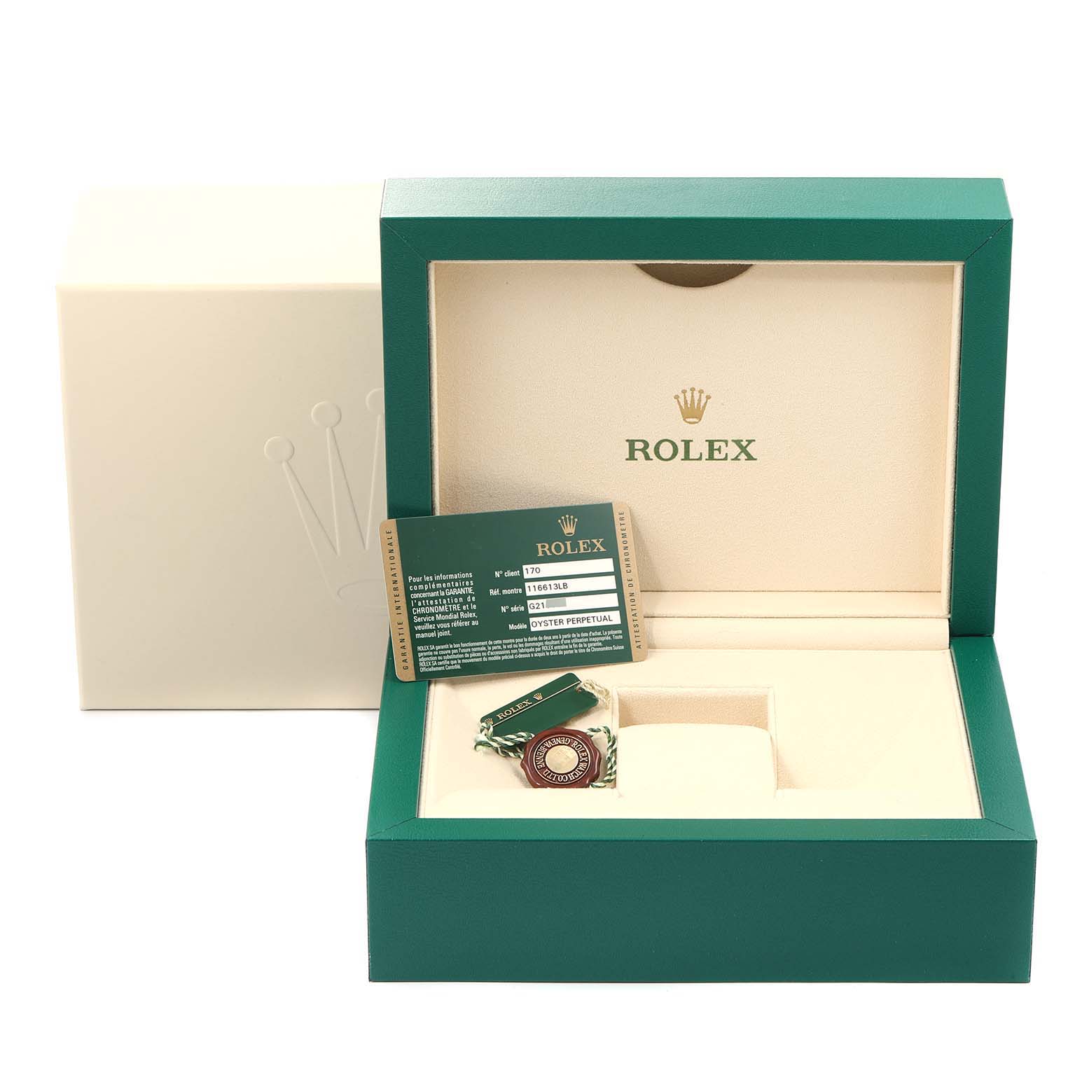 The image shows a Rolex Submariner 116613 Men
s Steel and Gold (two tone) Blue Dial 116613 Men
s Steel and Gold (two tone) Blue Dial watch box with tags and a warranty card, viewed from the front angle with the watch not present.