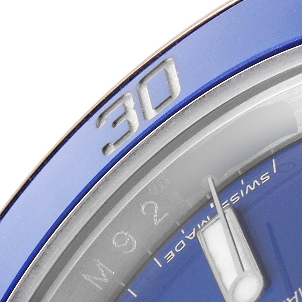 The image shows a close-up of the bezel and part of the dial of the Rolex Submariner 116619 Men's White Gold Blue Dial 116619 Men's White Gold Blue Dial watch, highlighting the "30" marker.