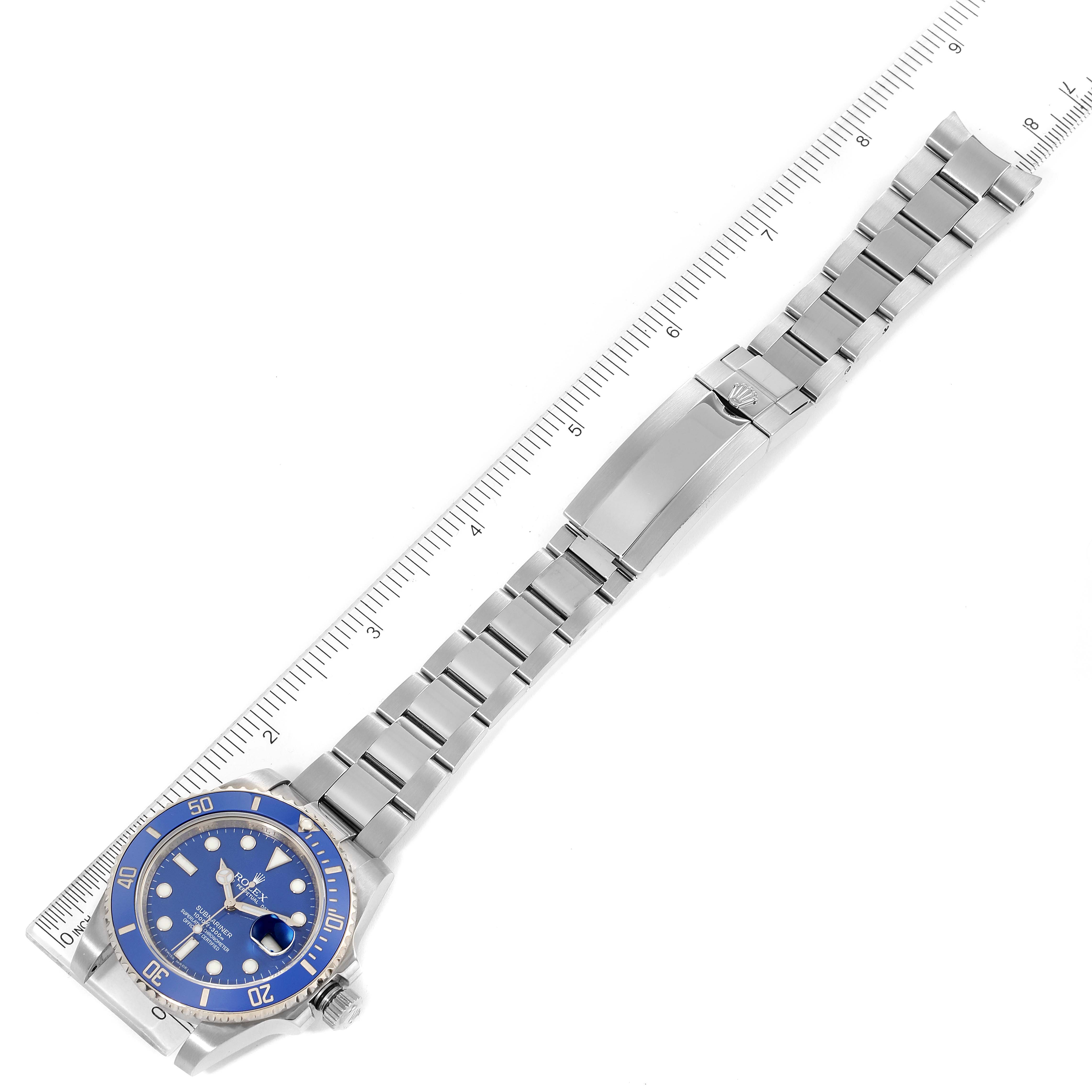 The image shows a top-down view of a Rolex Submariner 116619 Men's White Gold Blue Dial 116619 Men's White Gold Blue Dial watch, including its blue dial, bezel, case, and full metal bracelet.